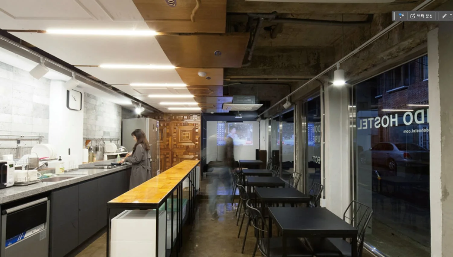 Street-facing cafe and breakfast area with a long counter