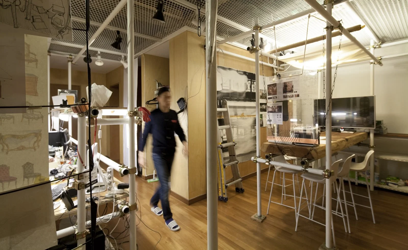 Shared studio built with scaffolding pipes