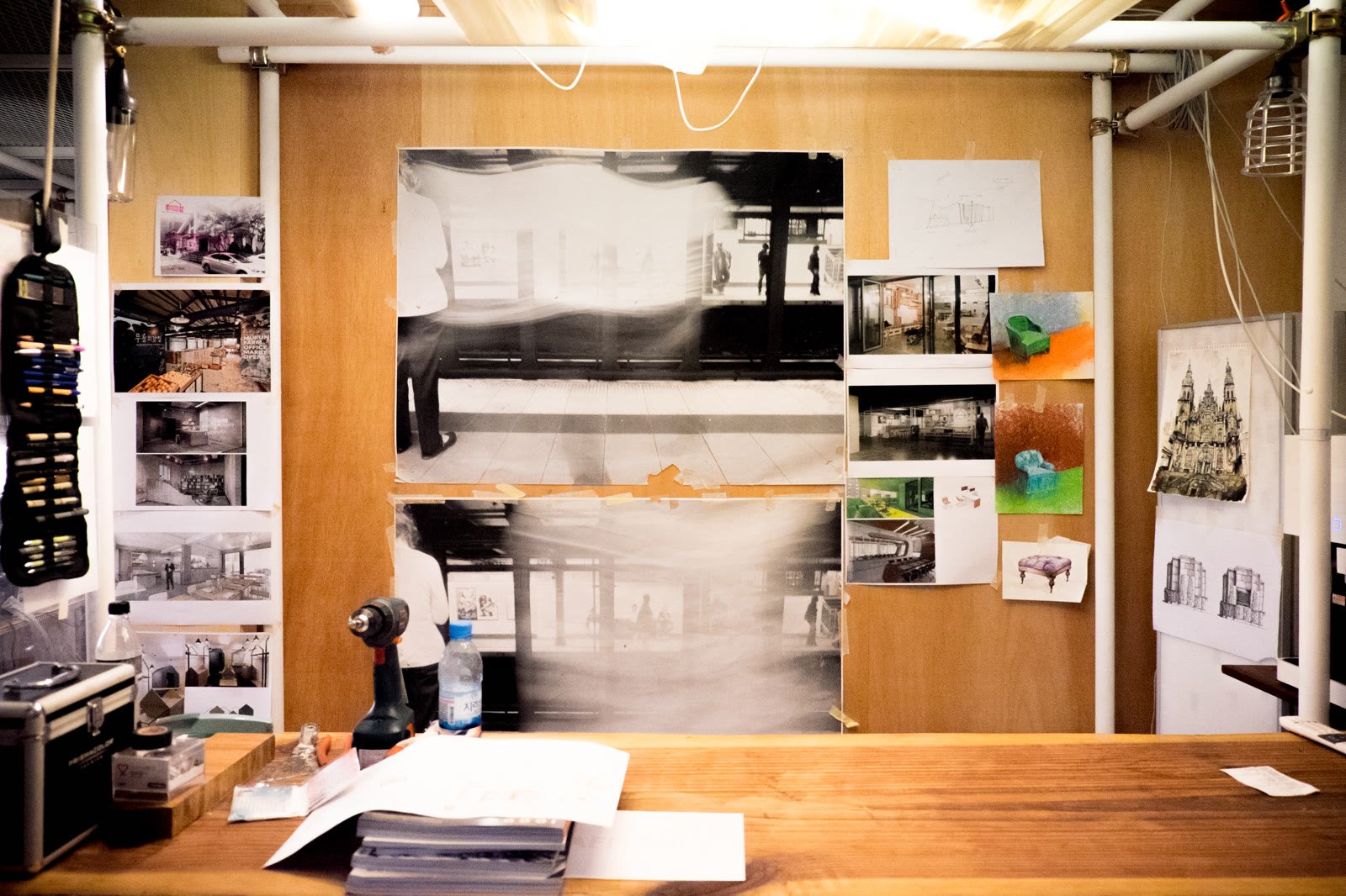 Stained plywood wall with a pipe frame