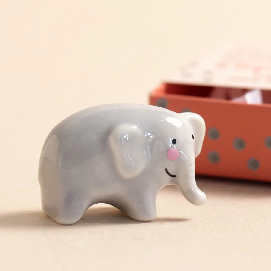 Tiny Matchbox Ceramic Elephant stood.jpeg