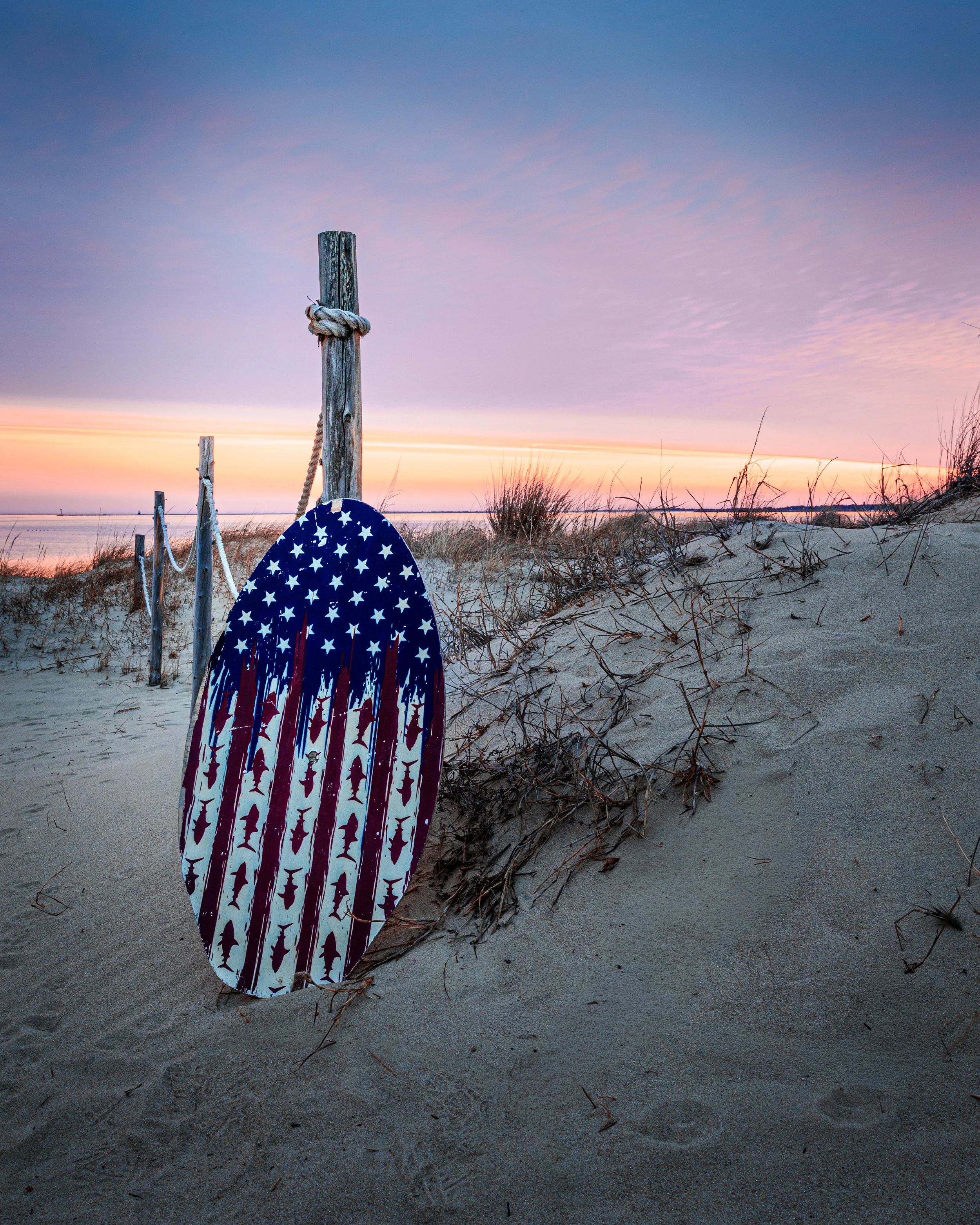 Boogie Board on beach in Lewes De at sunrise