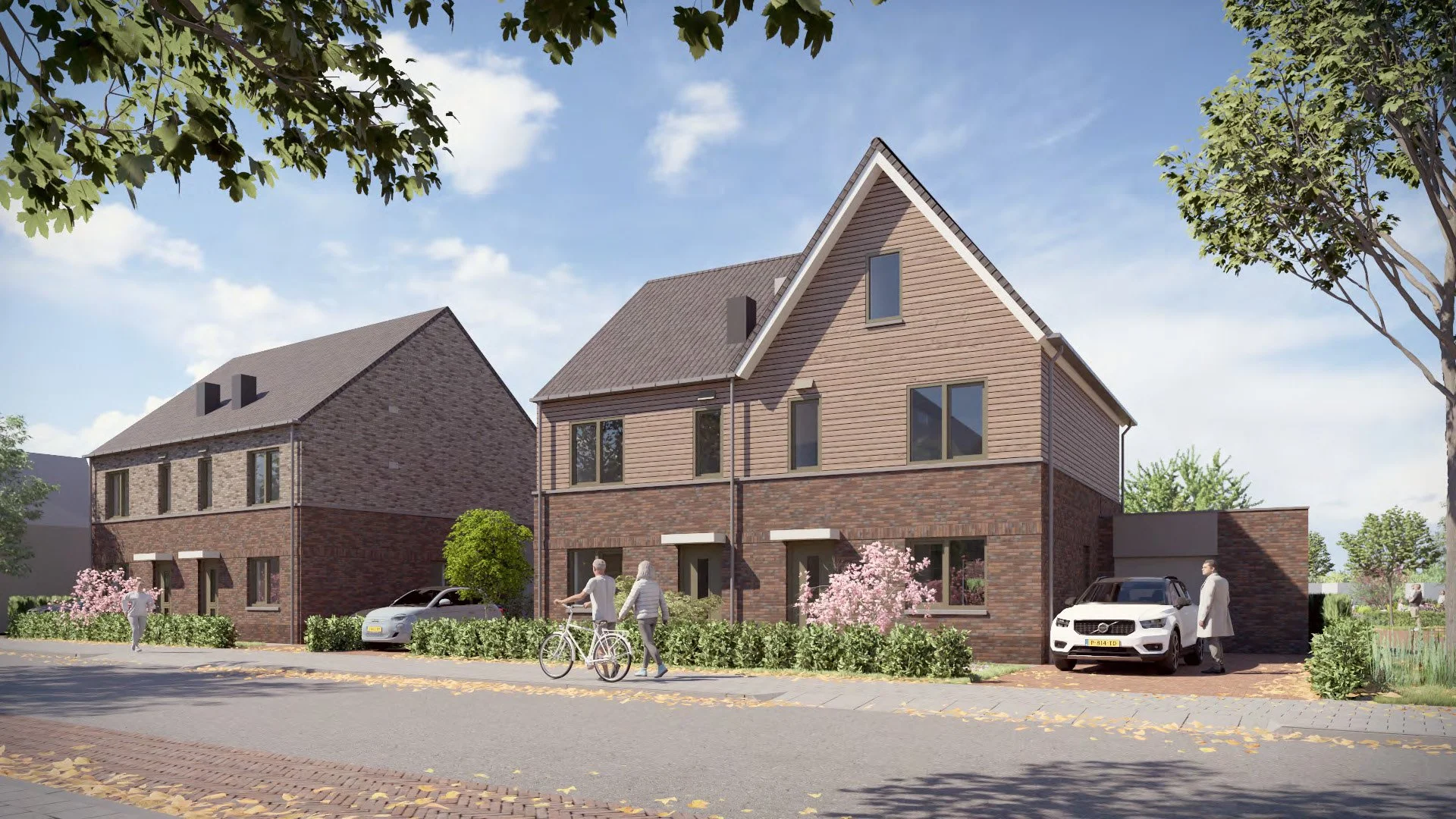 Twee moderne huizen met een gemixte gevel van bakstenen en hout, omgeven door groene tuinen en bloemen, met mensen die wandelen en fietsen in de voorgrond, en auto's geparkeerd voor de huizen. De lucht is blauw met enkele wolken.