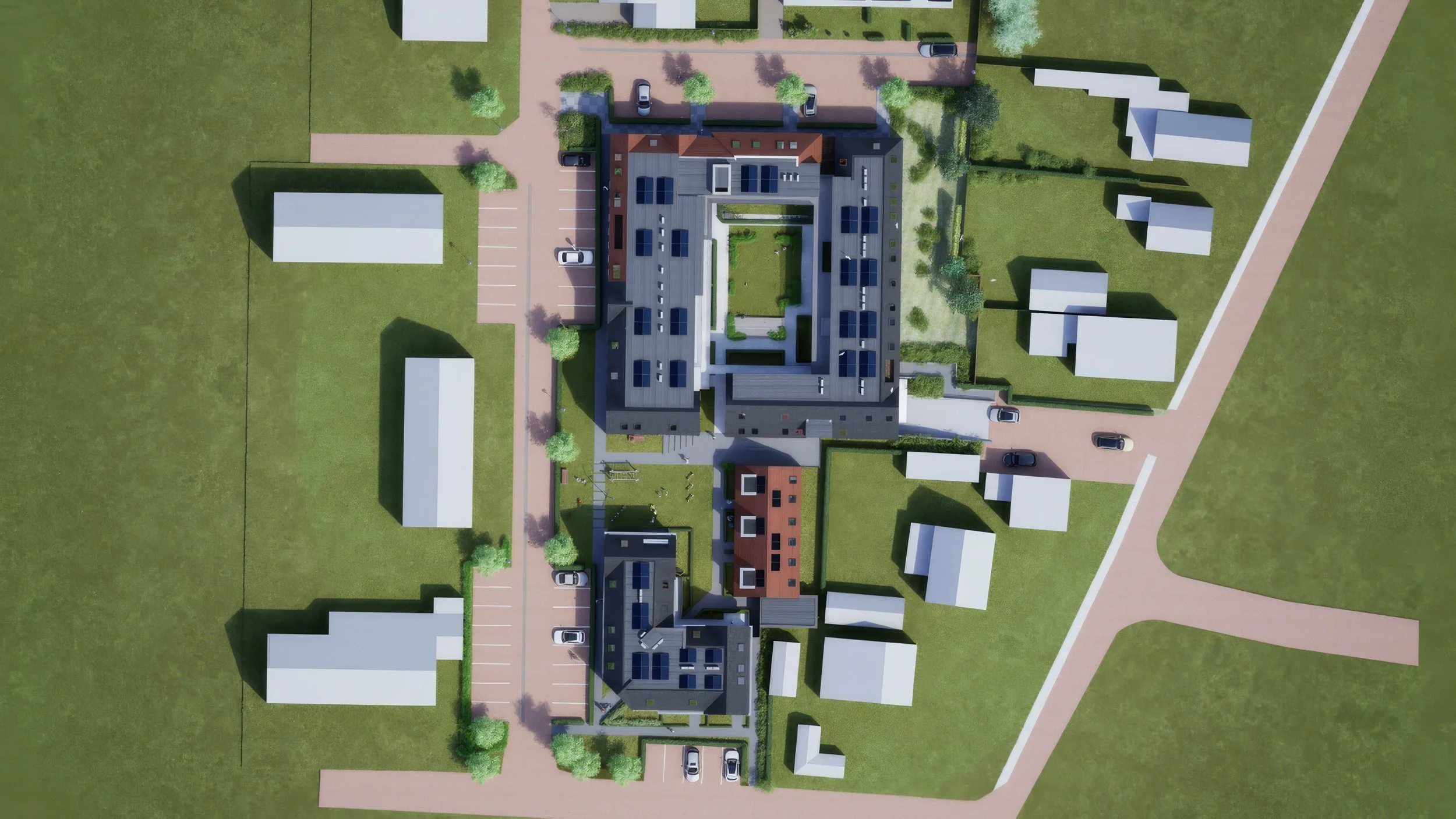 Luchtfoto van een modern appartementencomplex met meerdere zonnepanelen en groenvoorzieningen, omgeven door wandelpaden, parkeerplaatsen en omliggende groene grasvelden.