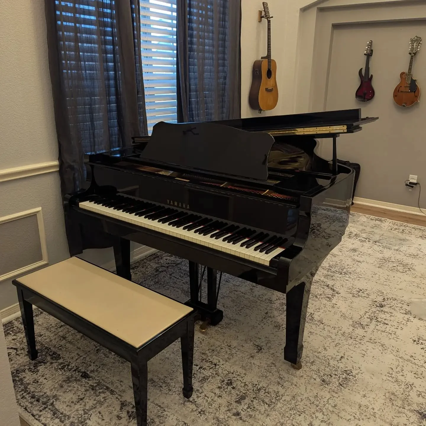Mallory's mom is moving, so we are now the proud recipients of her Yamaha C3 grand piano!