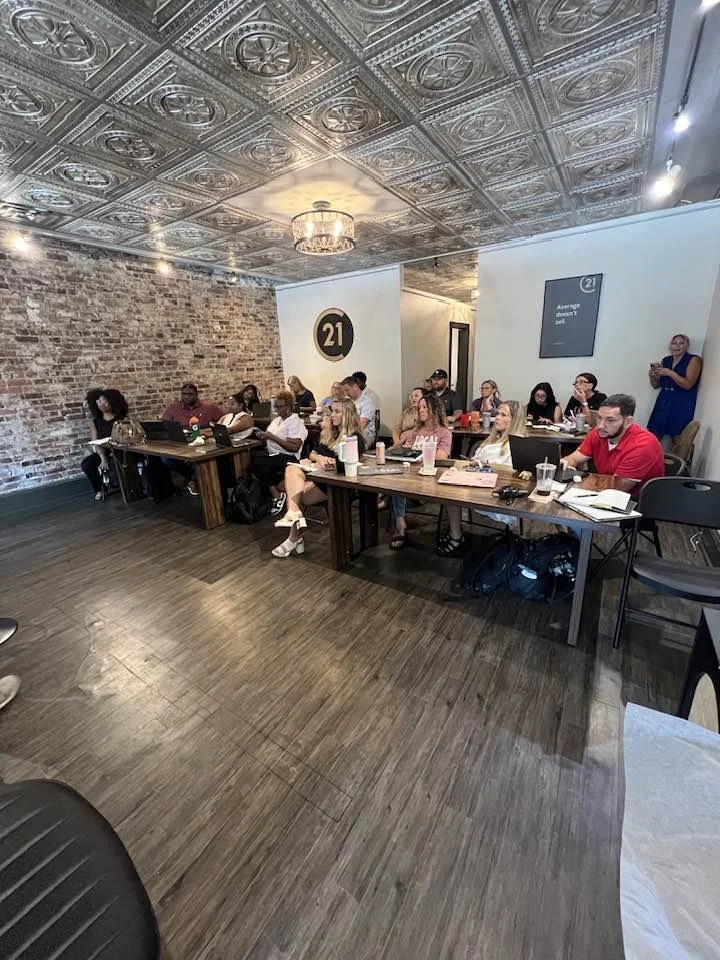 team members at lexington century 21 location for training class