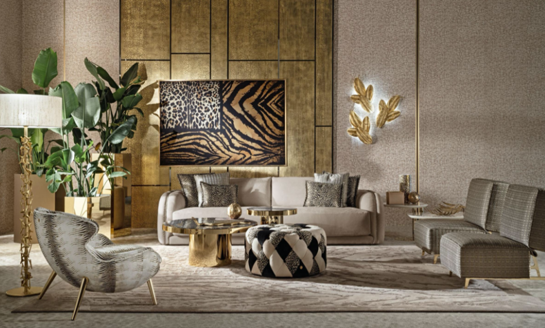 Elegant living room with beige sofa, patterned accent chairs, gold and black coffee table, large green houseplant, wall art with animal patterns, textured wall panels, and lighting fixtures.
