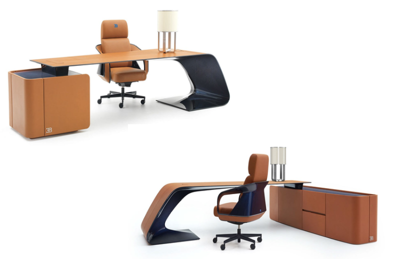 Modern office desk setup with a tan leather chair, a wooden desk, a matching storage cabinet, and a contemporary table lamp.