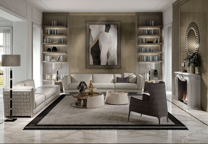 Elegant living room with white sofas, black and white armchair, built-in bookshelves, abstract wall art, fireplace, and modern decor.