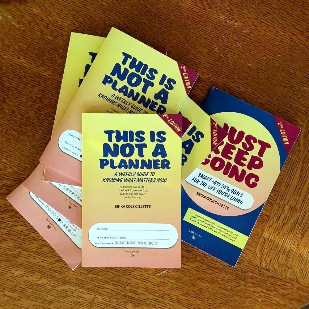 Stack of ADHD goal setting workbooks