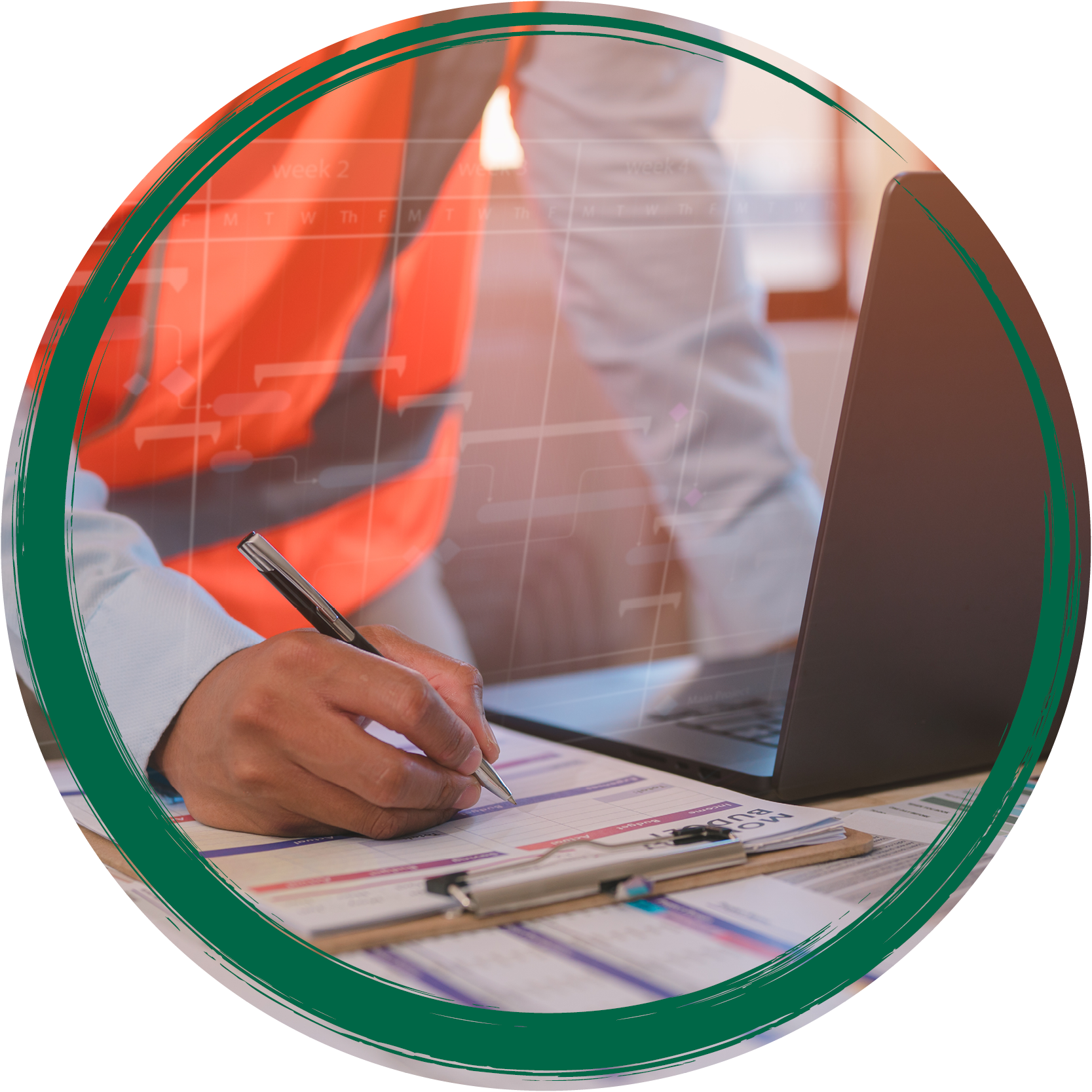 man wearing construction vest, leaning over laptop and charts on-site