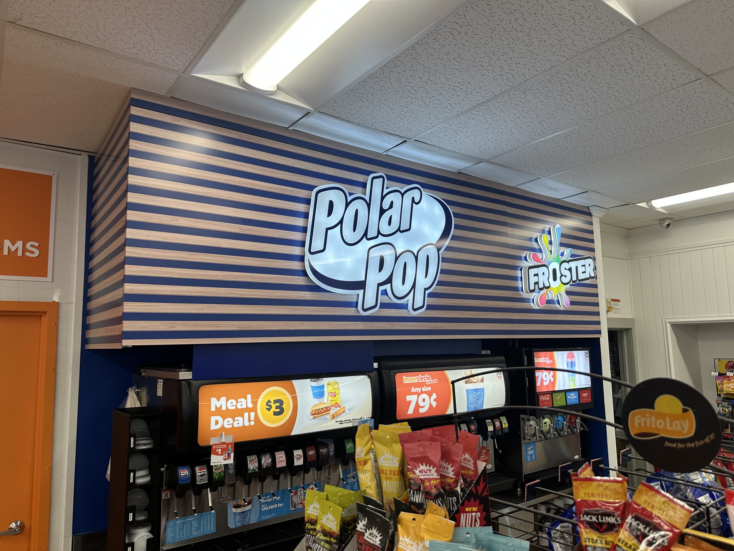 Polar Pop drink station with fountain drinks, meat sticks and snacks in the foreground