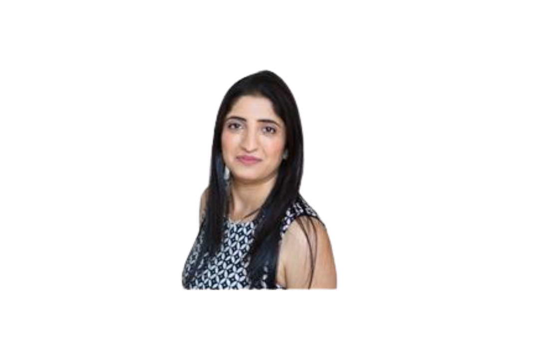 Portrait of a woman with long black hair, wearing a sleeveless black and white patterned top, smiling slightly, against a plain background.