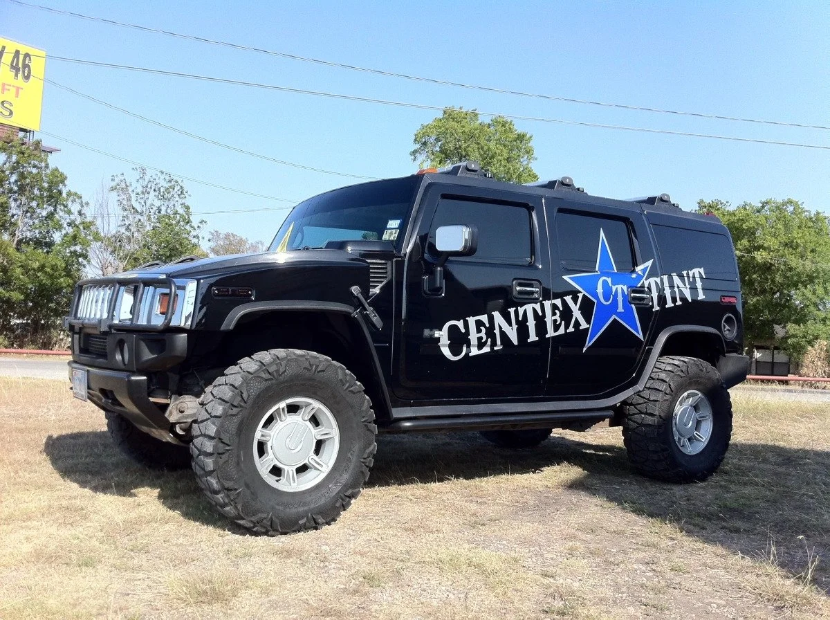 Hummer H2 with leveling kit on 37 nitto mud grapplers and 30% window tint (Copy)