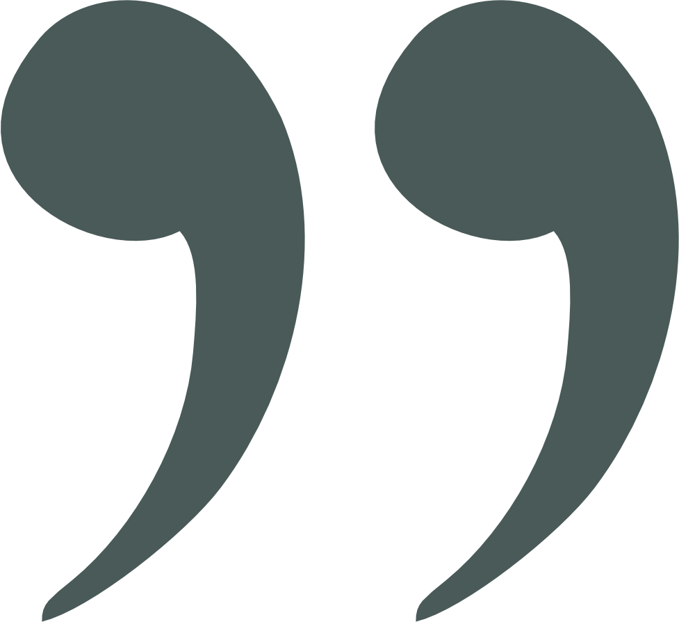 Two large dark quotation marks on a black background