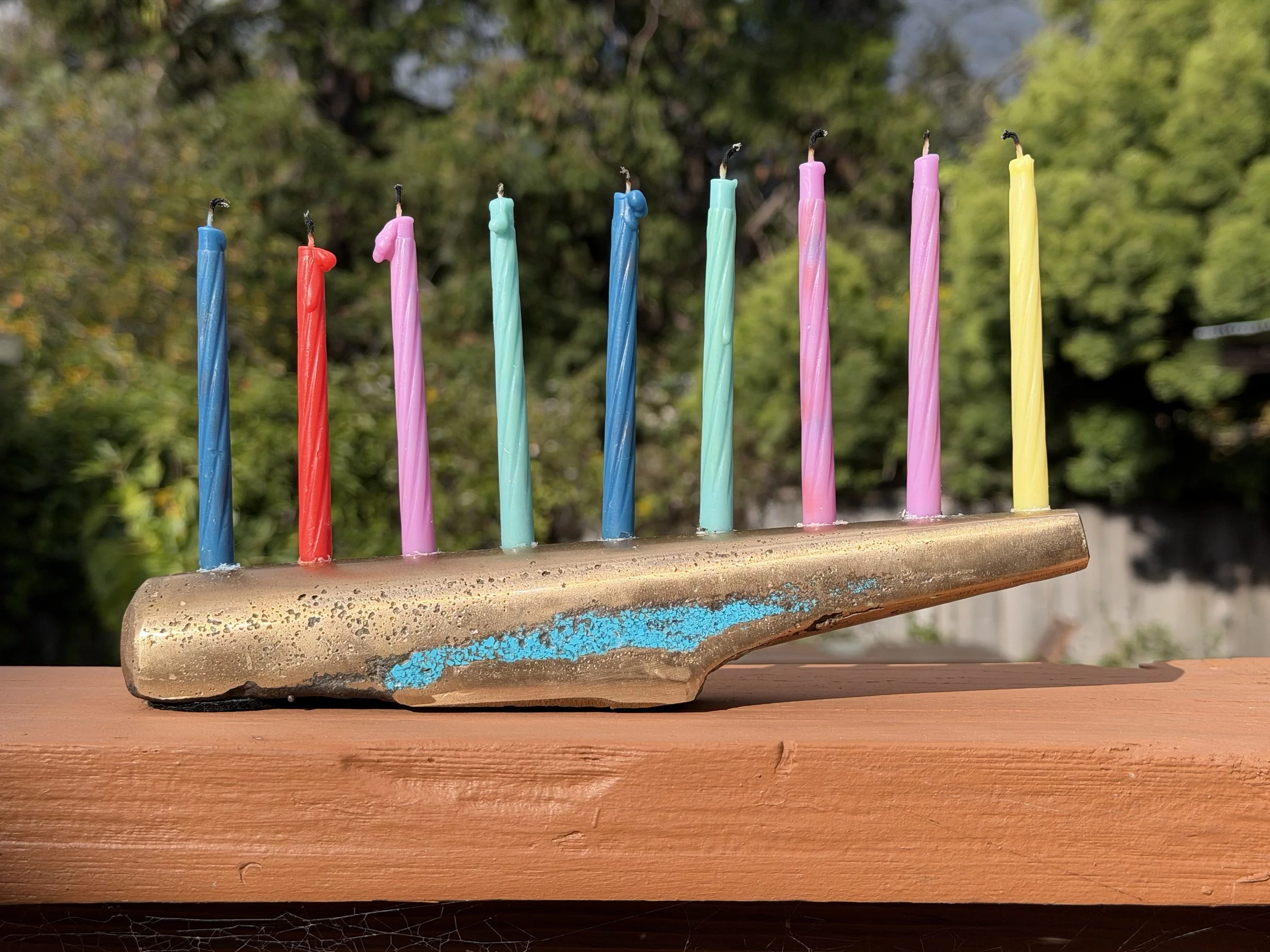 A menorah made in CAD— 3D printed—  Cast in bronze