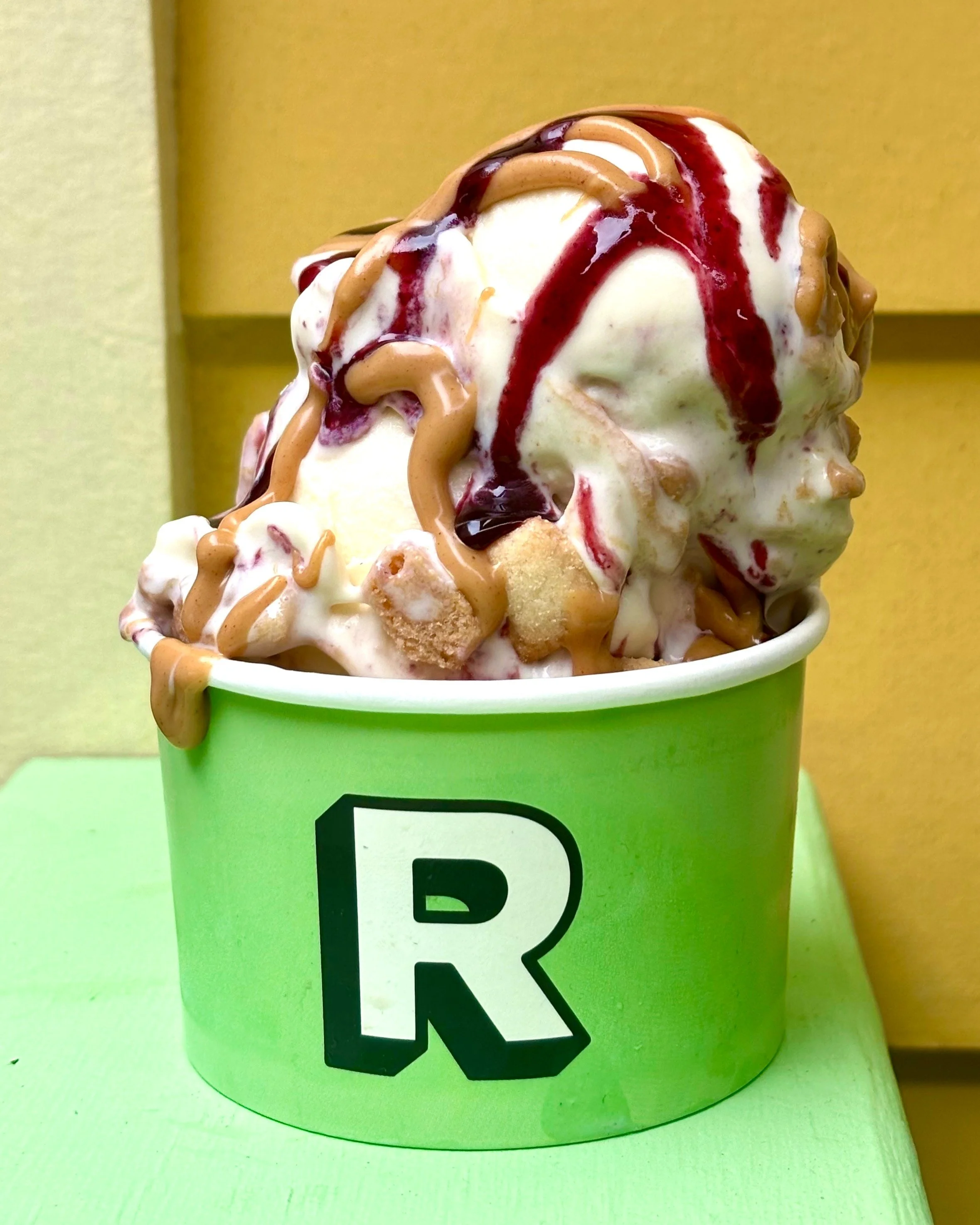 PB&amp;J Today! 
Vanilla Custard with Reese's Peanut Butter, Black Raspberry Puree, and Shortbread Cookie! 

Amazing on it's own, or get creative and make an Oreo Overload or Banana Pudding Spinner with it.
