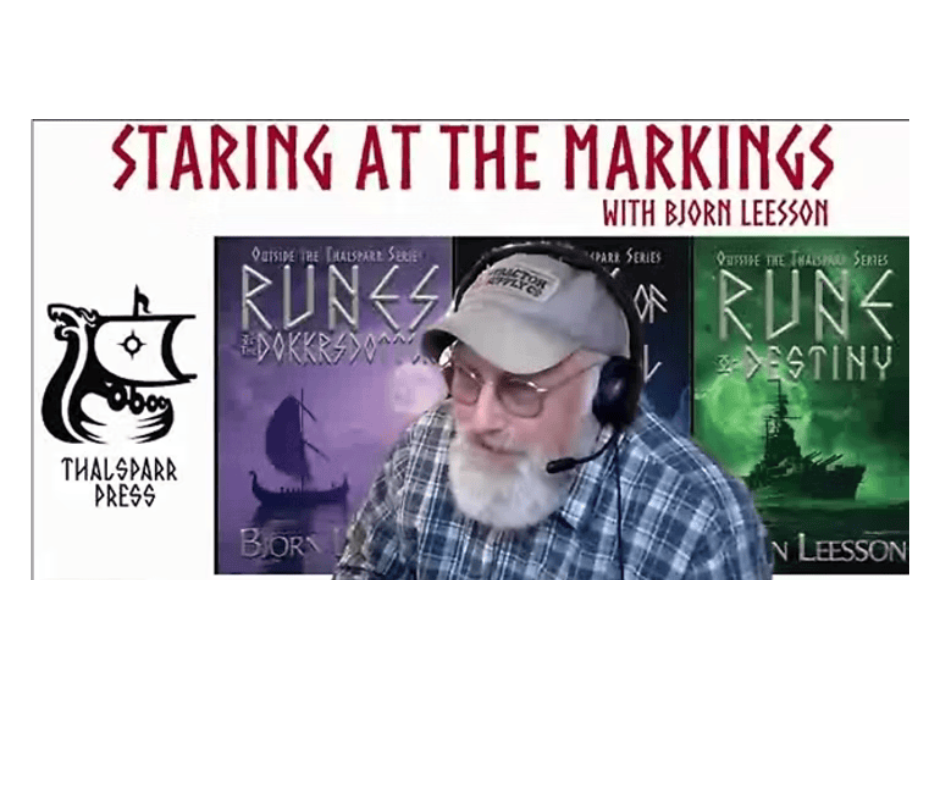 A man with a beard, glasses, and a baseball cap wearing a headset, sitting in front of a banner that reads "Staring at the Markings with Bjorn Lesson". The banner features book covers for "Rune of Destiny" and "Rune of Destiny" by Bjorn Lesson.