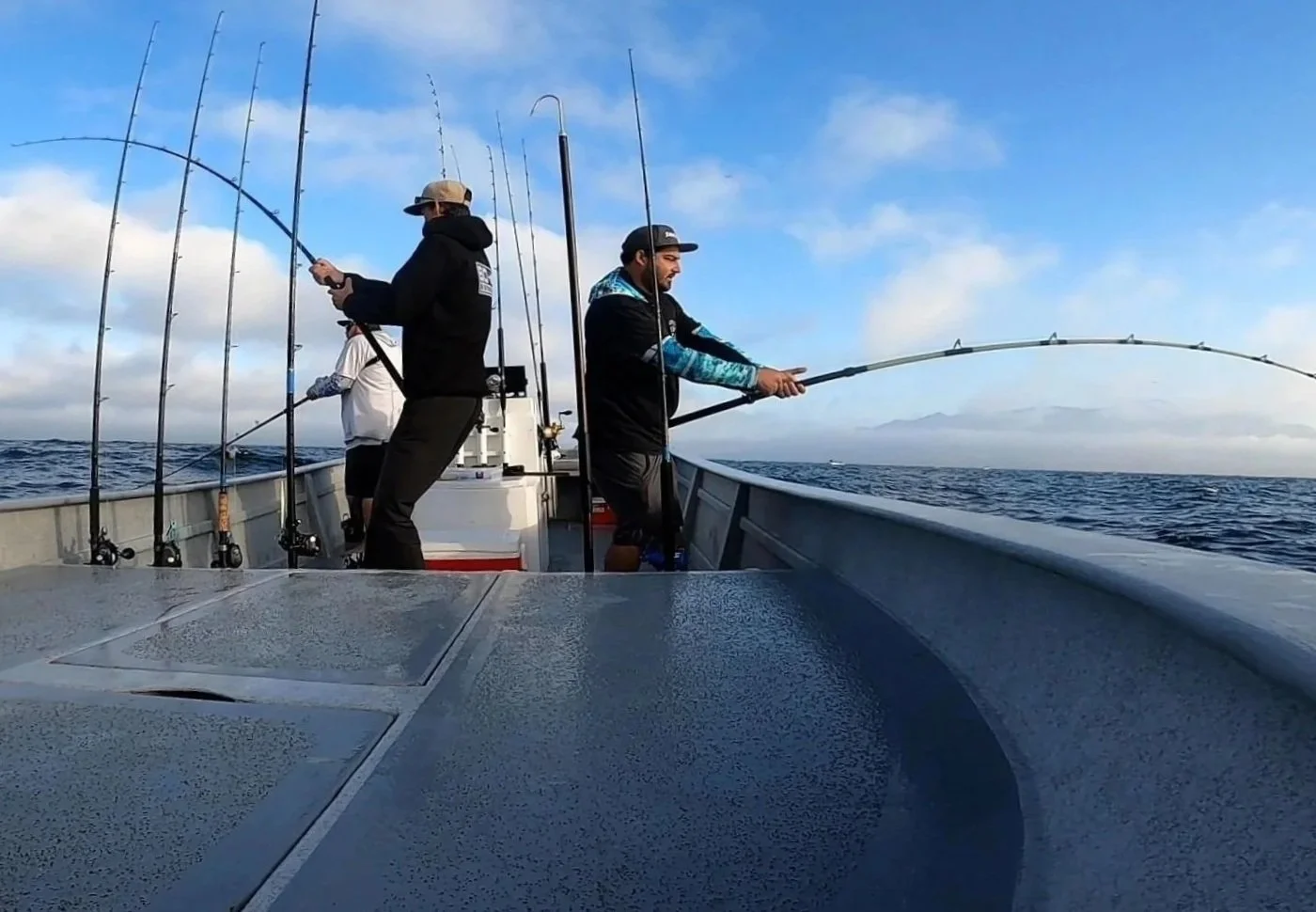 Guests fishing offshore on a boat near Cedros during a guided day trip.