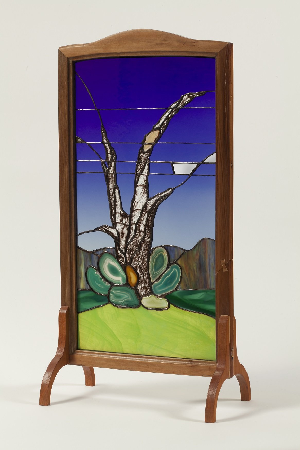 "Yankee Vanity (the Old Maple Snag)", Sept. 2019-Sept. 2023, fused and painted stained glass, mirror, and agates in a mahogany and cherry frame, 37.5"h x 16"w x 9.25”d.  