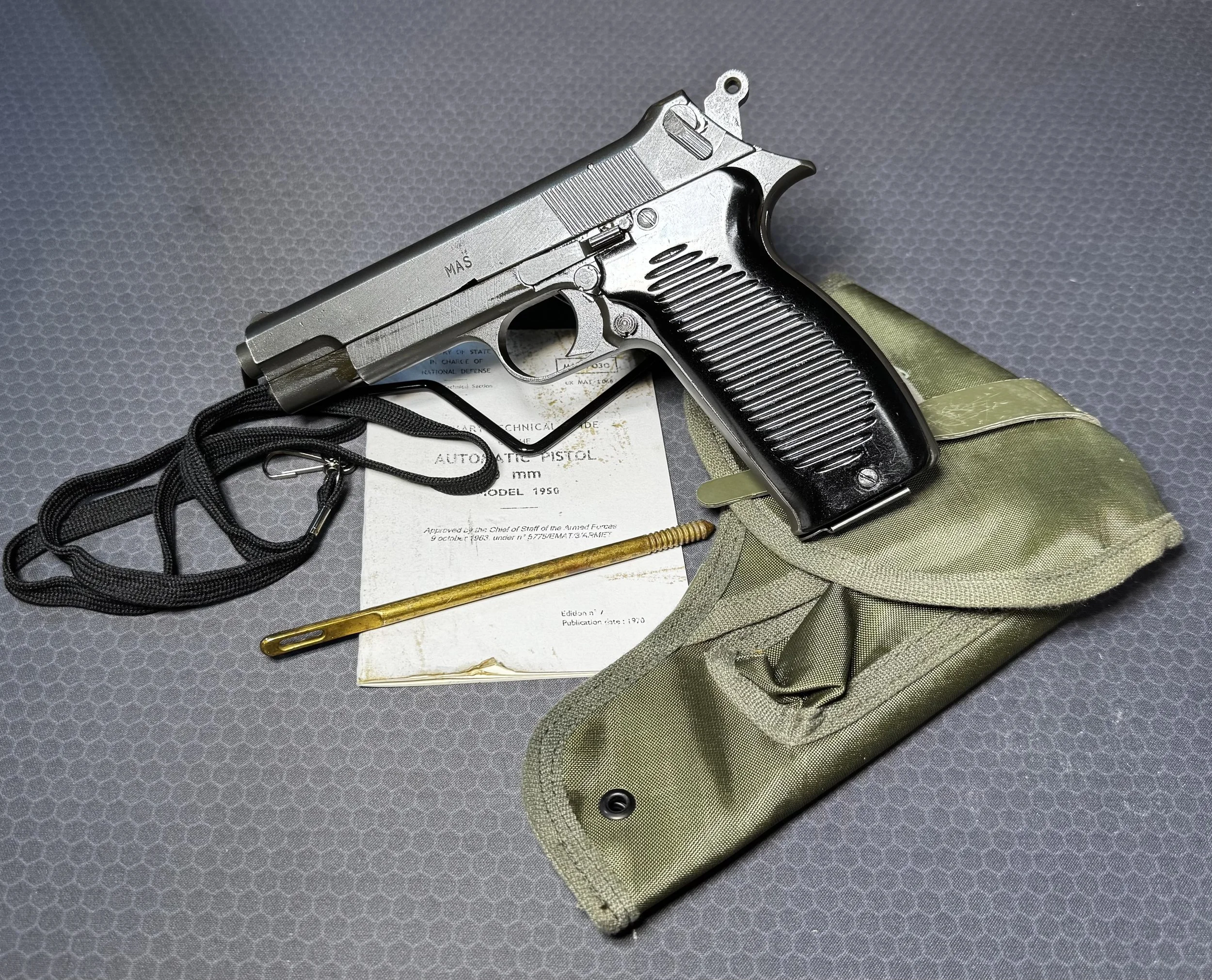 NAVY ARMS MAC 50 PISTOLS SURPLUS 9MM PISTOL W/ HLSTER, CLEANING KIT, LANYARD, ORIGINAL FRENCH MANUAL
$1138.50
