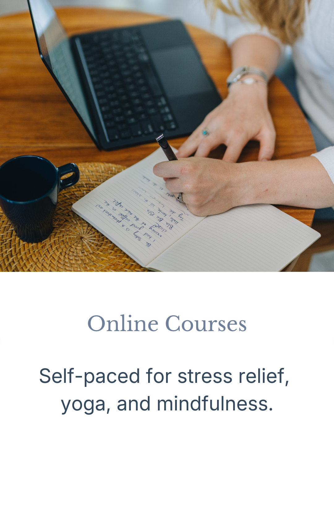 A woman writing in a notebook with a laptop and a dark blue mug on a woven placemat on a wooden table. Text on the image reads 'Online Courses' and 'Self-paced for stress relief, yoga, and mindfulness.'.
