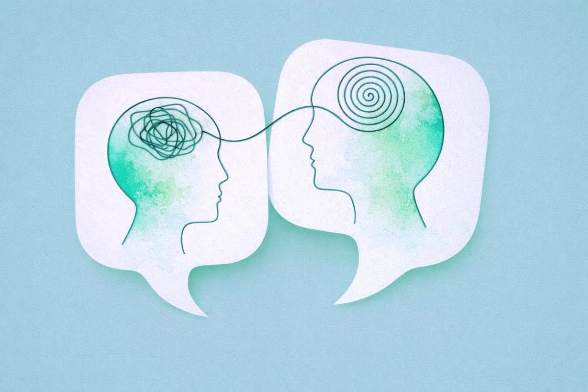 Two stylized line drawings of human heads in profile facing each other, connected by a line. The left head has a tangled line representing confusion or complex thoughts, while the right head has a spiral line indicating focus or clear thinking. Both are inside speech bubbles with a soft blue background.