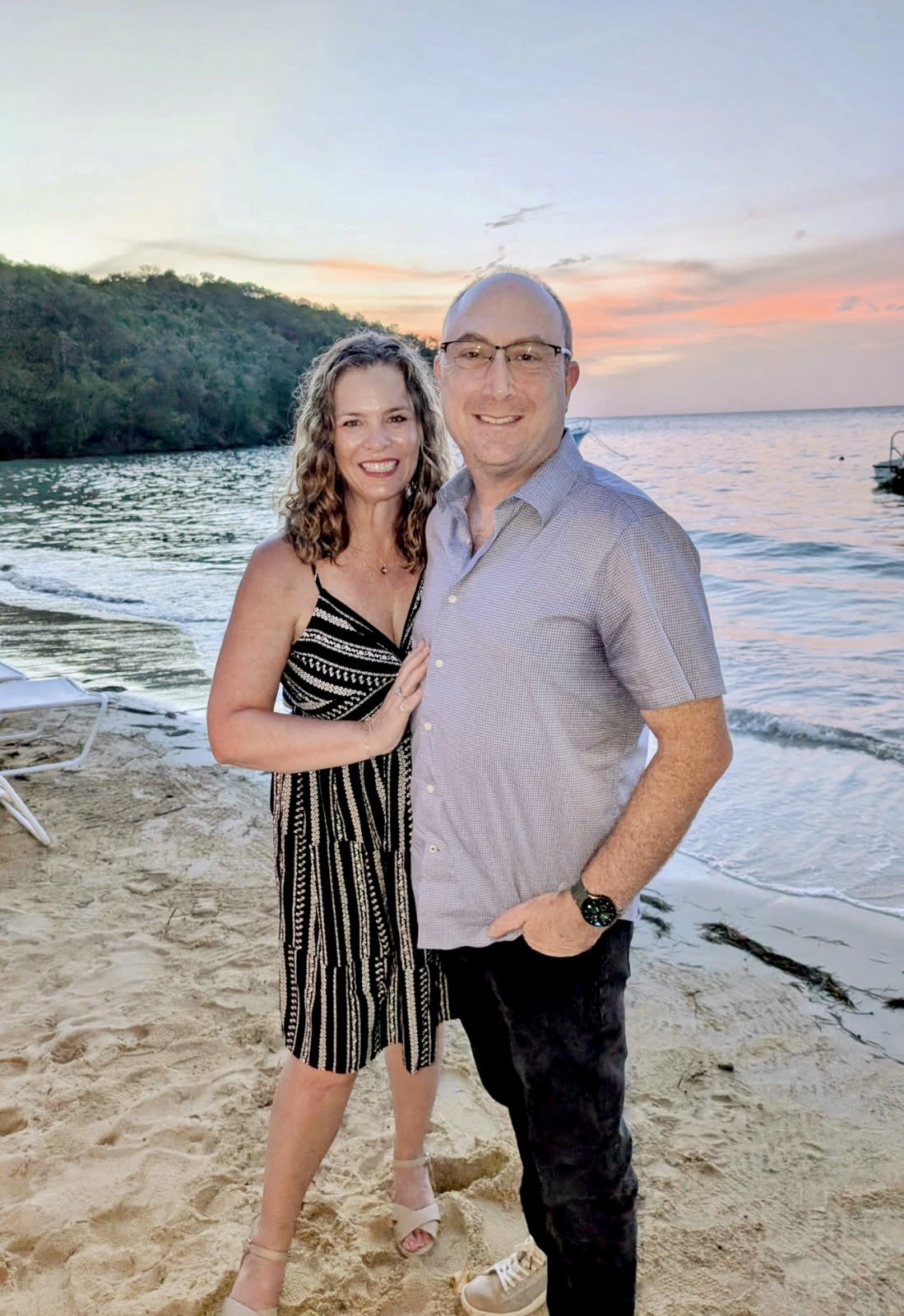 Jeff and Jessica on the beach of Couples Sans Souci all-inclusive resort in Ocho Rios, Jamaica