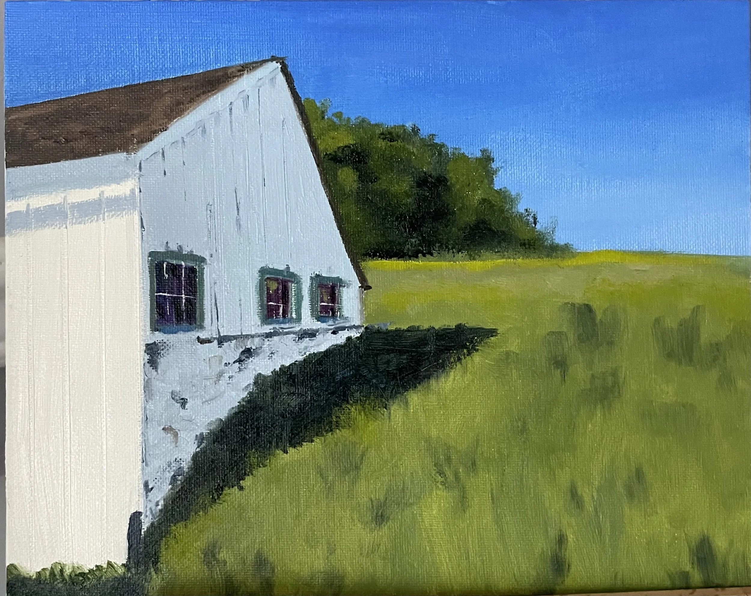 A painting of a white barn with a brown roof, green windows, situated beside a green field with dense trees in the background under a blue sky.