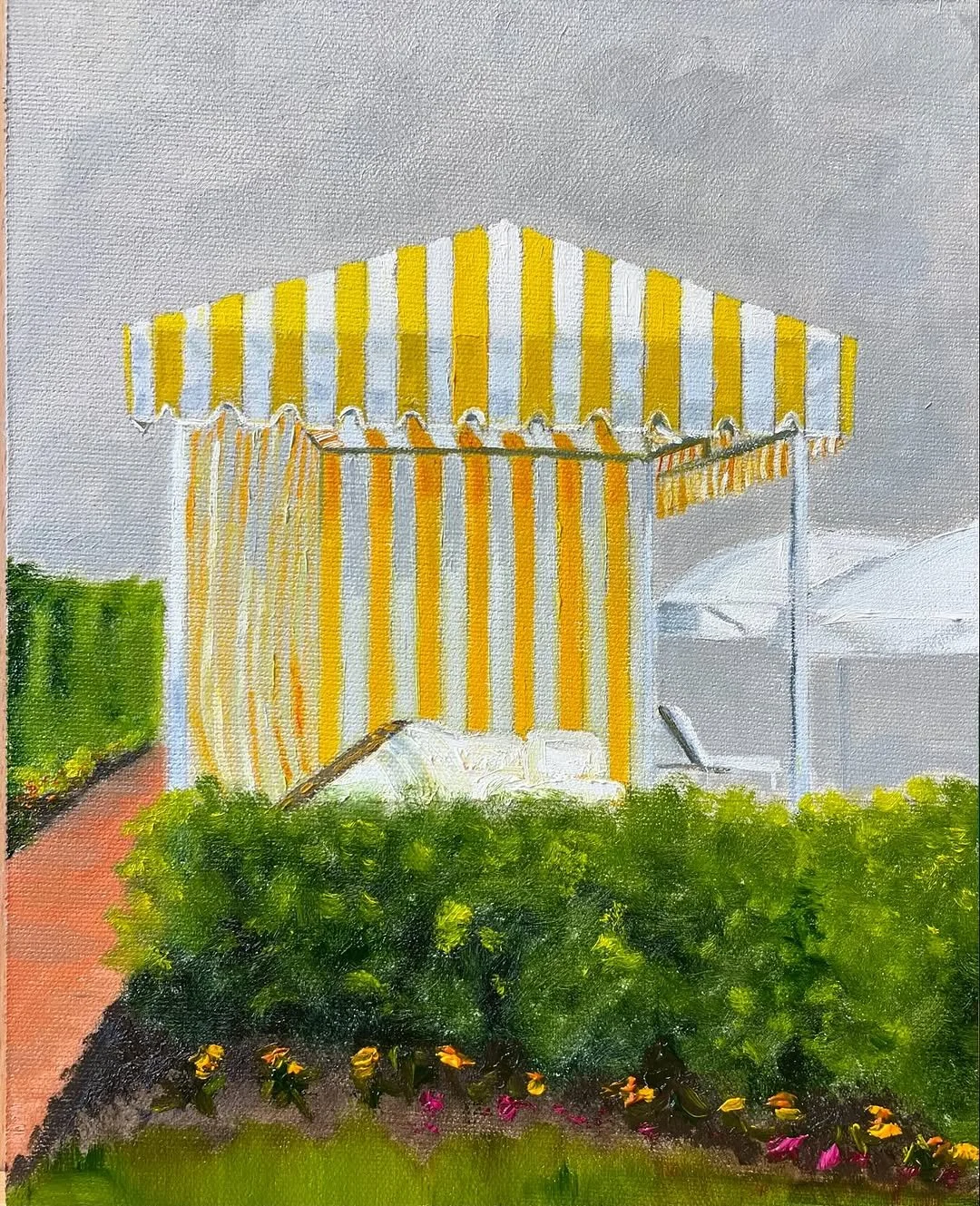 Painting of a small striped yellow and white patio tent with greenery and flowers in the foreground and a gray sky background.