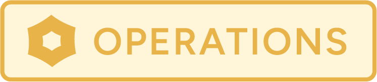 A sign with a shield icon and the word 'OPERATIONS' in gold letters on a beige background