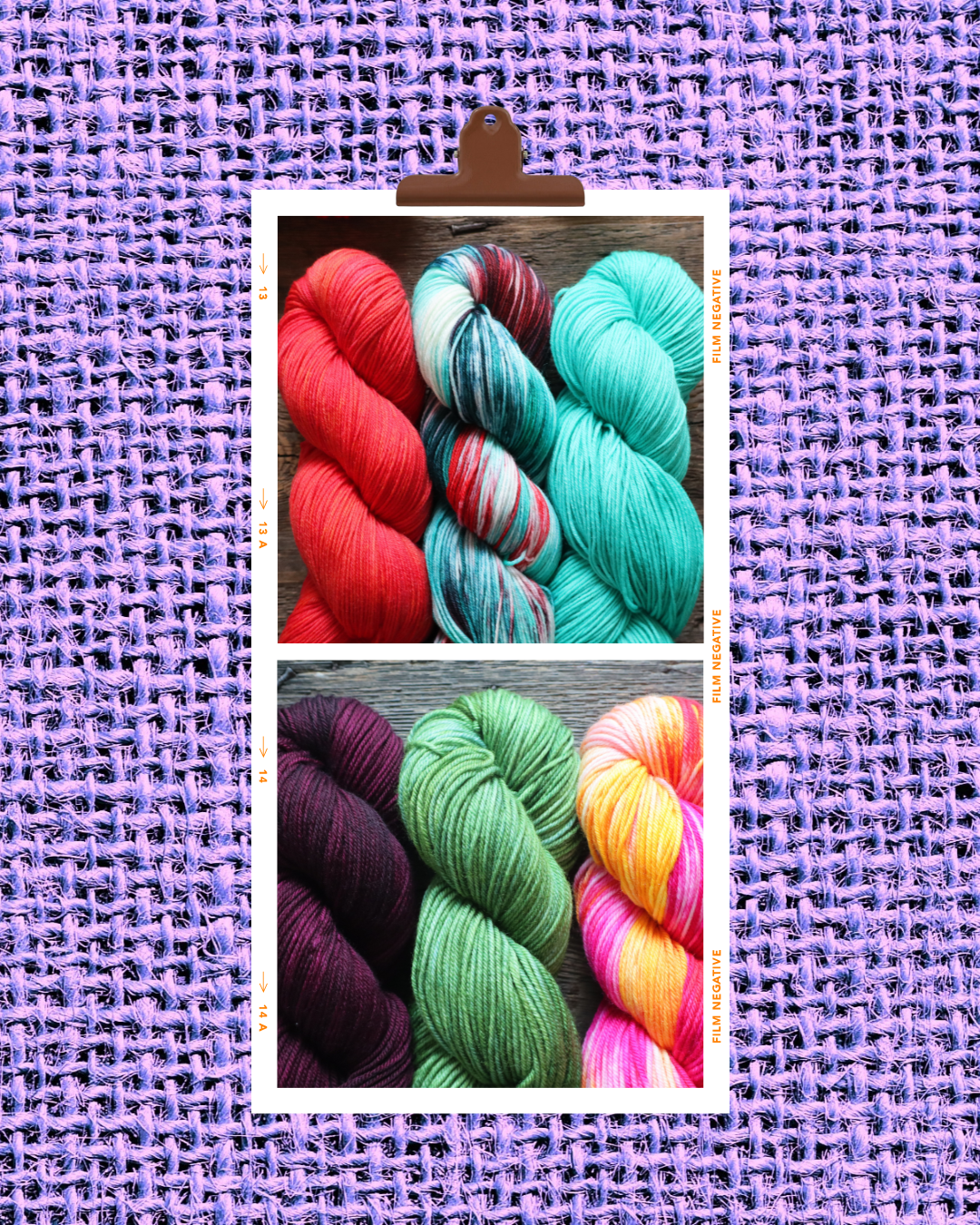 Colorful skeins of yarn in red, teal, green, purple, yellow, pink, and multicolored, arranged on a wooden surface with a purple woven fabric background.