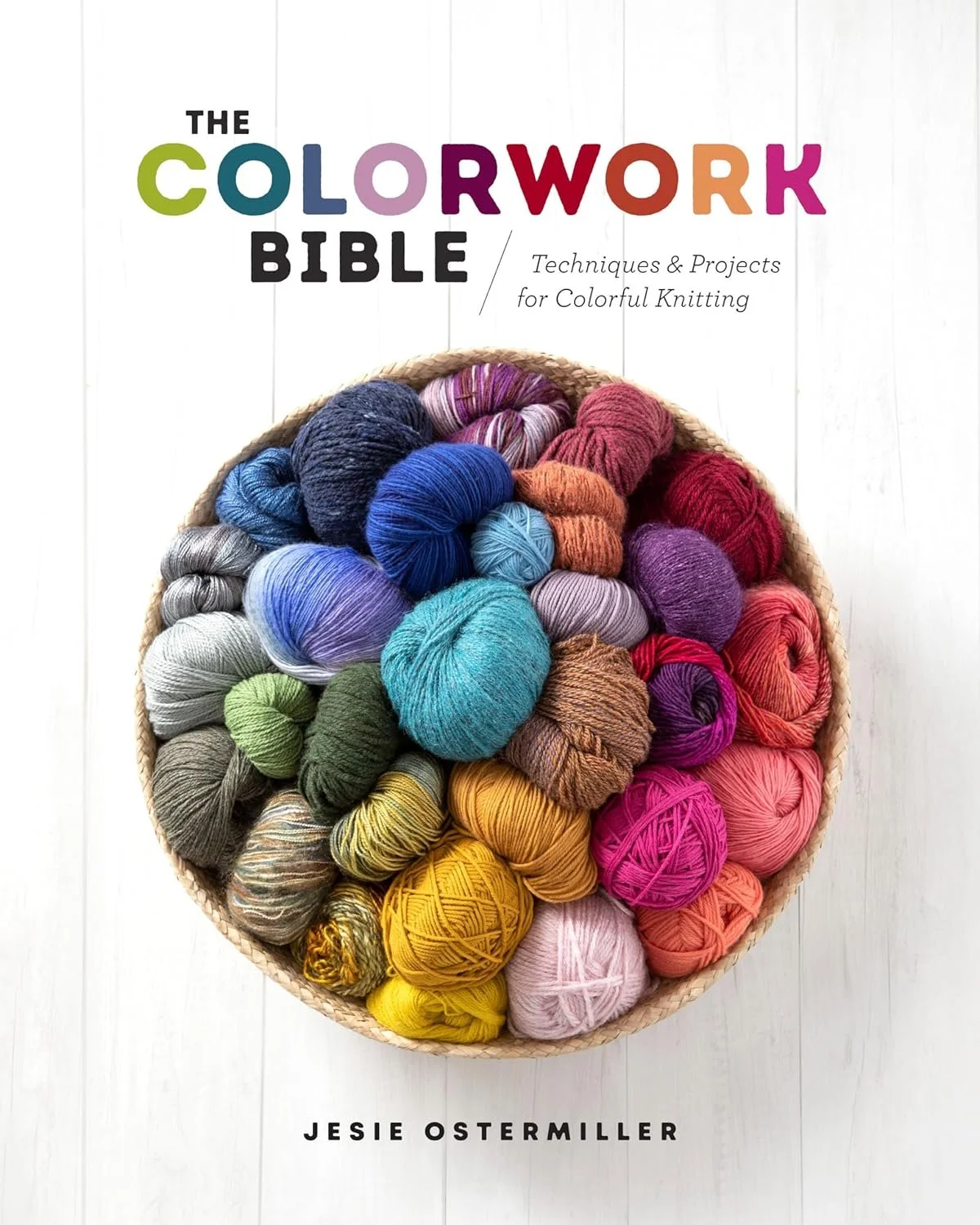 Brightly colored balls of yarn on the cover of this book.