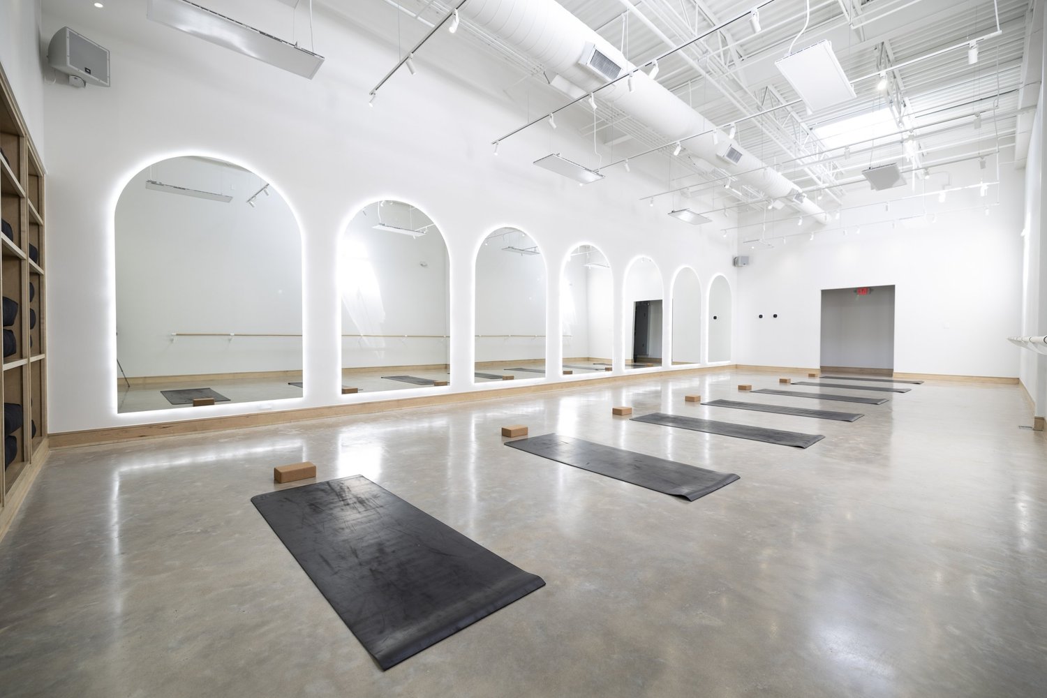 Mission studio with arched windows and skylights