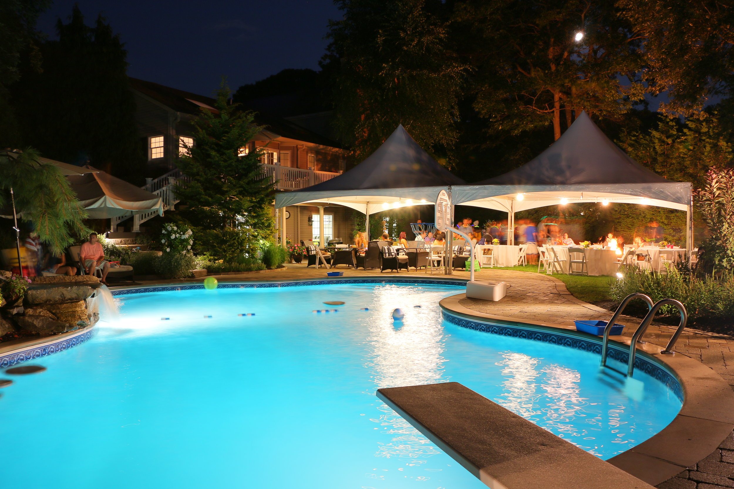 Contemporary fiberglass pool integrated into outdoor living space in Smithtown, NY