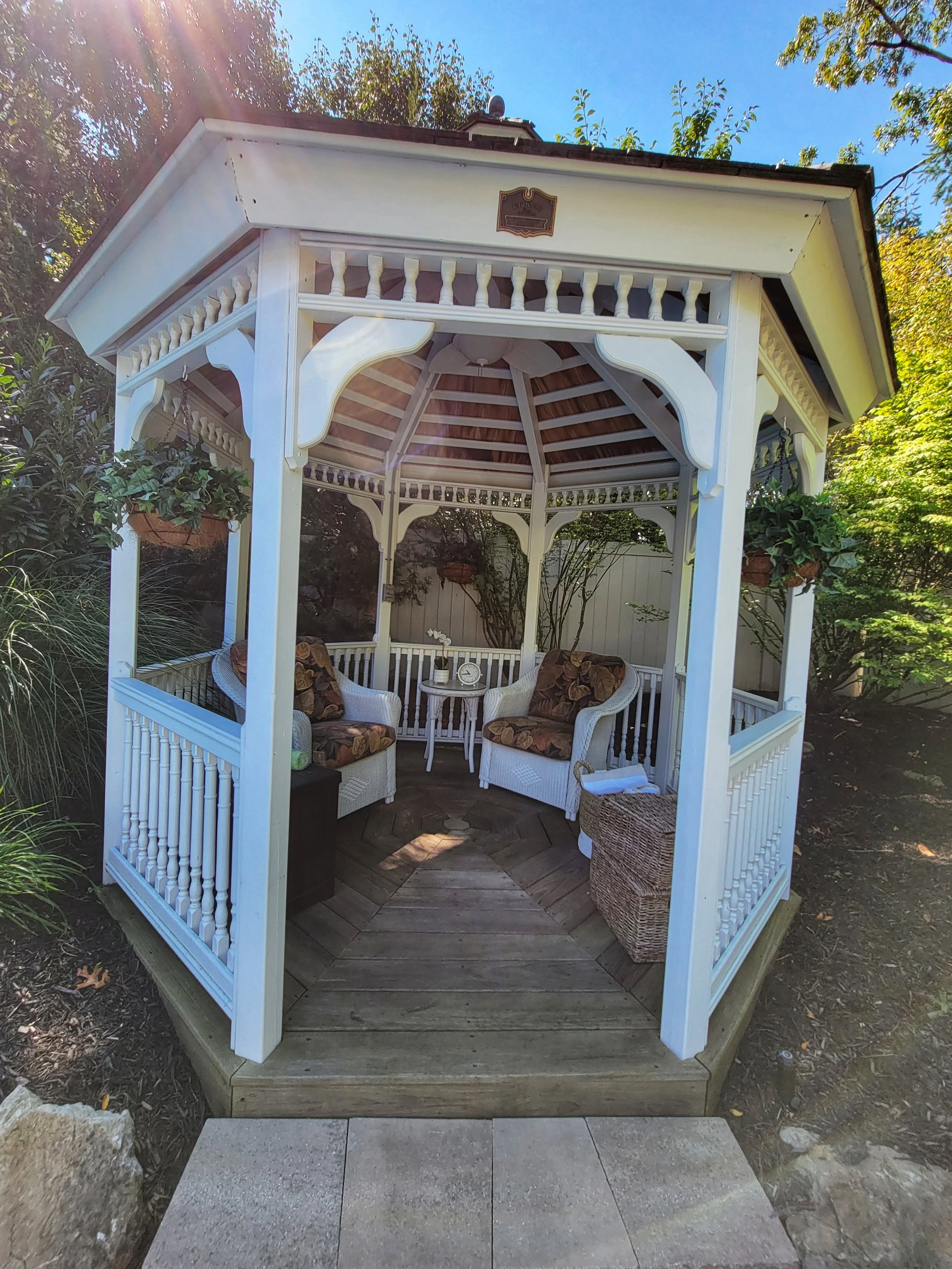 Freestanding gazebo integrated into a landscaped backyard in Babylon, NY