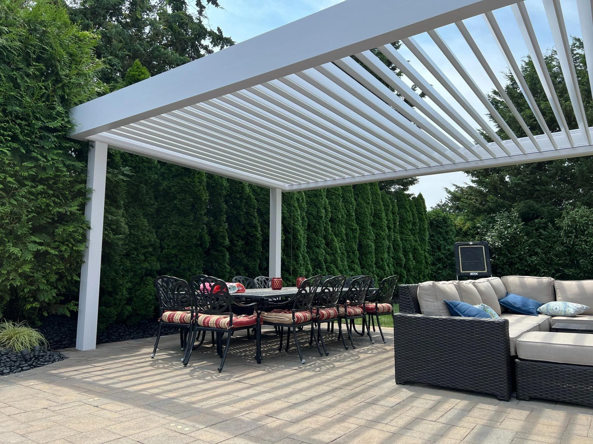 Aluminum louvered pergola designed for sun and rain control in Long Island, NY