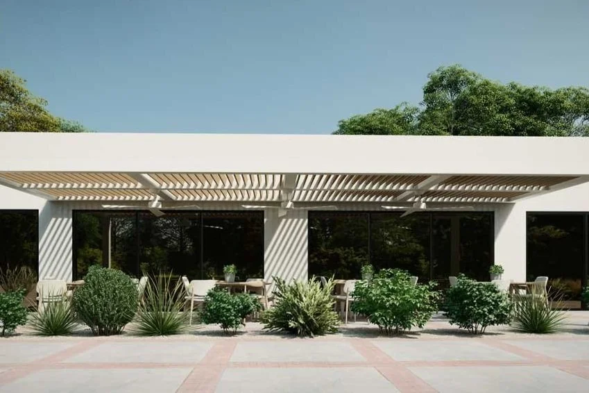 Pergola with operable louvers creating dynamic light patterns in Long Island, NY