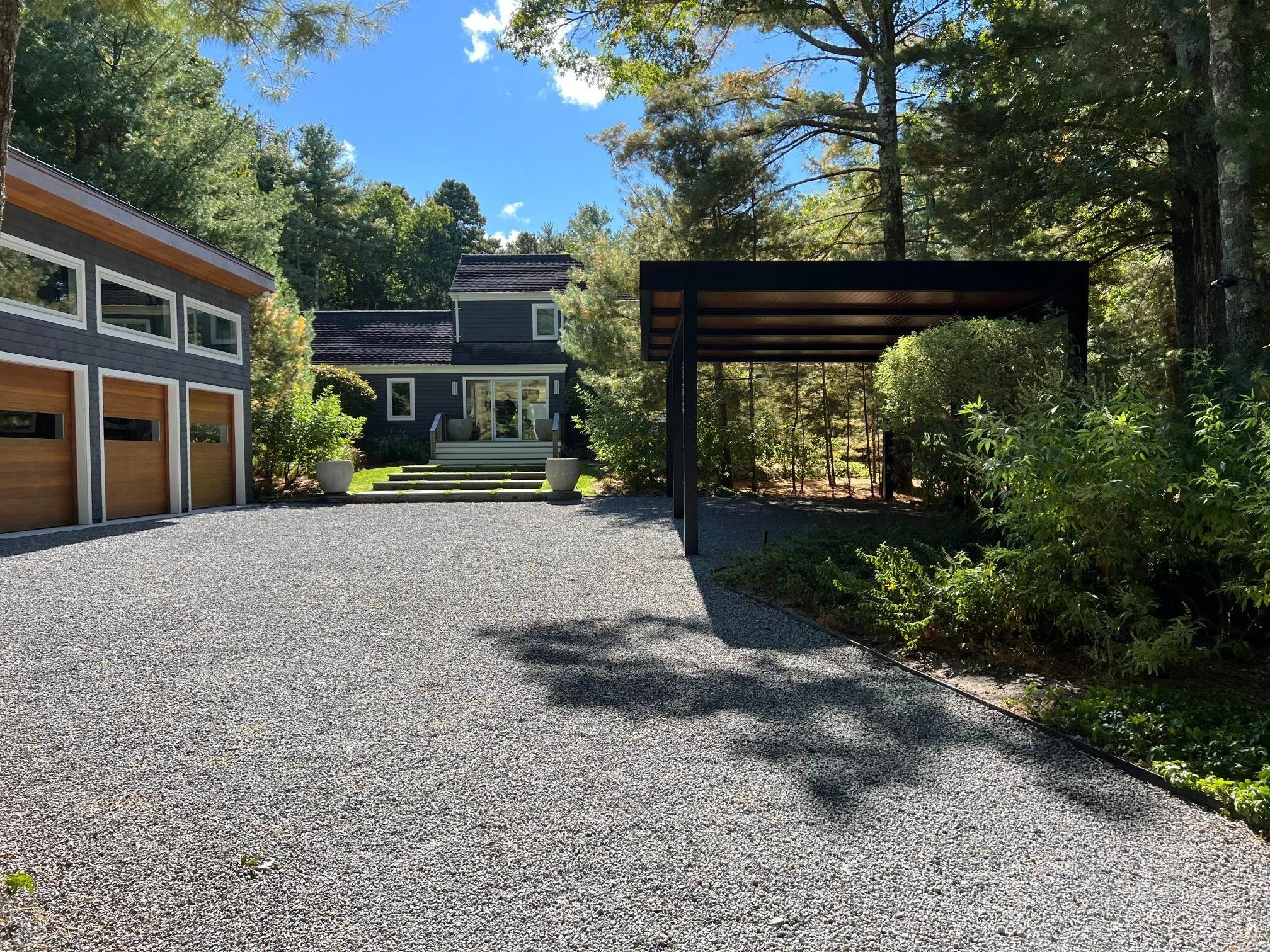 Outdoor pergola with louvered roof panels and modern detailing in Long Island, NY