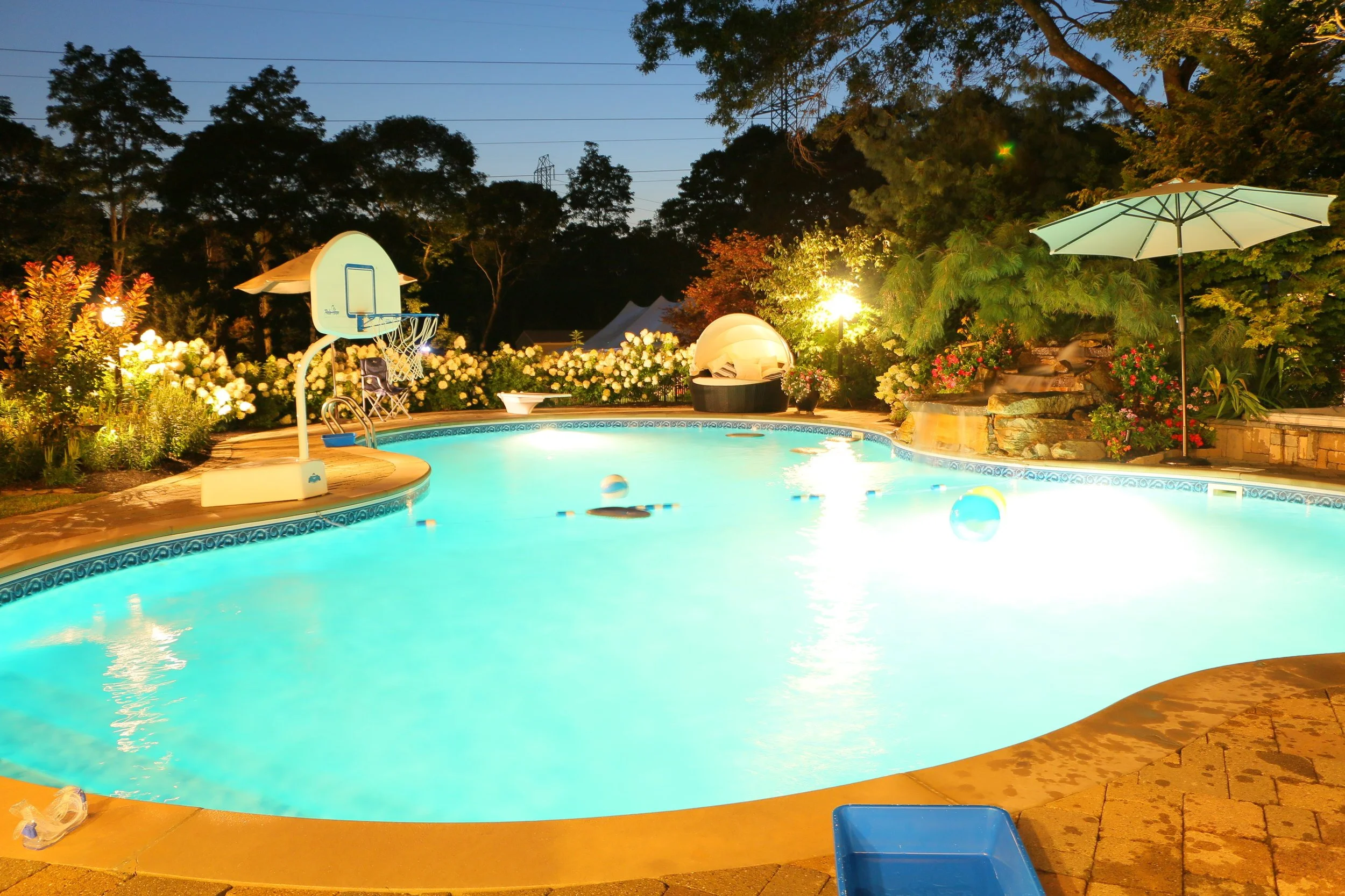 Outdoor lighting highlighting stonework and natural textures in Southampton, NY