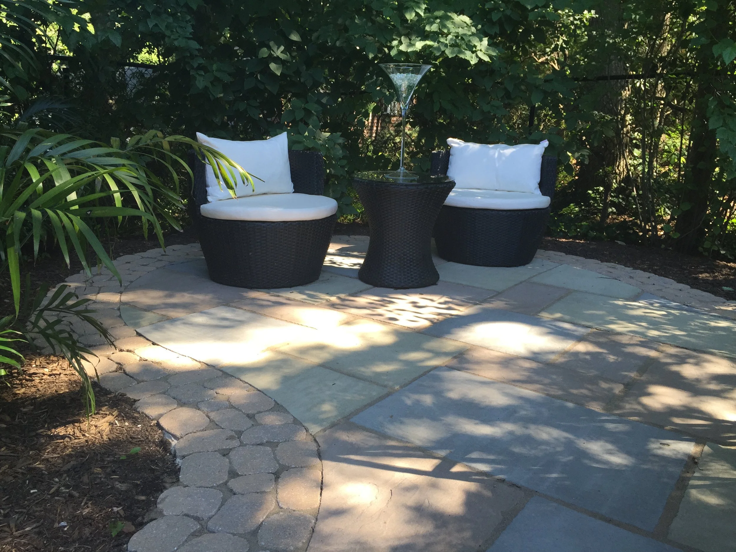 Custom Plantings designed to complement stone hardscaping in Huntington, NY