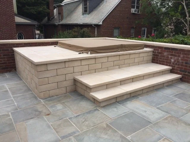Tanning ledge pool design in East Norwich, NY
