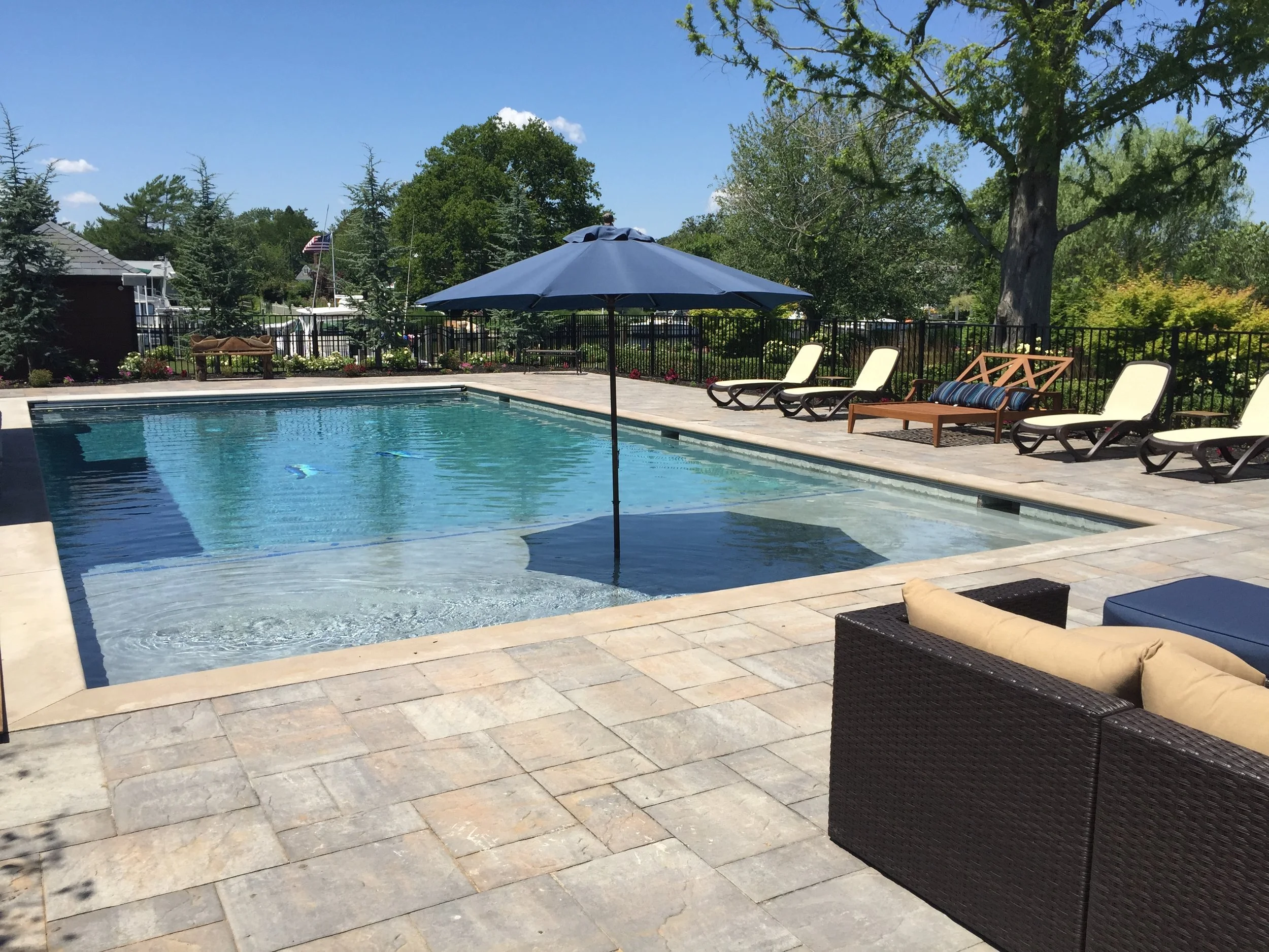 Evening pool lighting design in Miller Place, NY