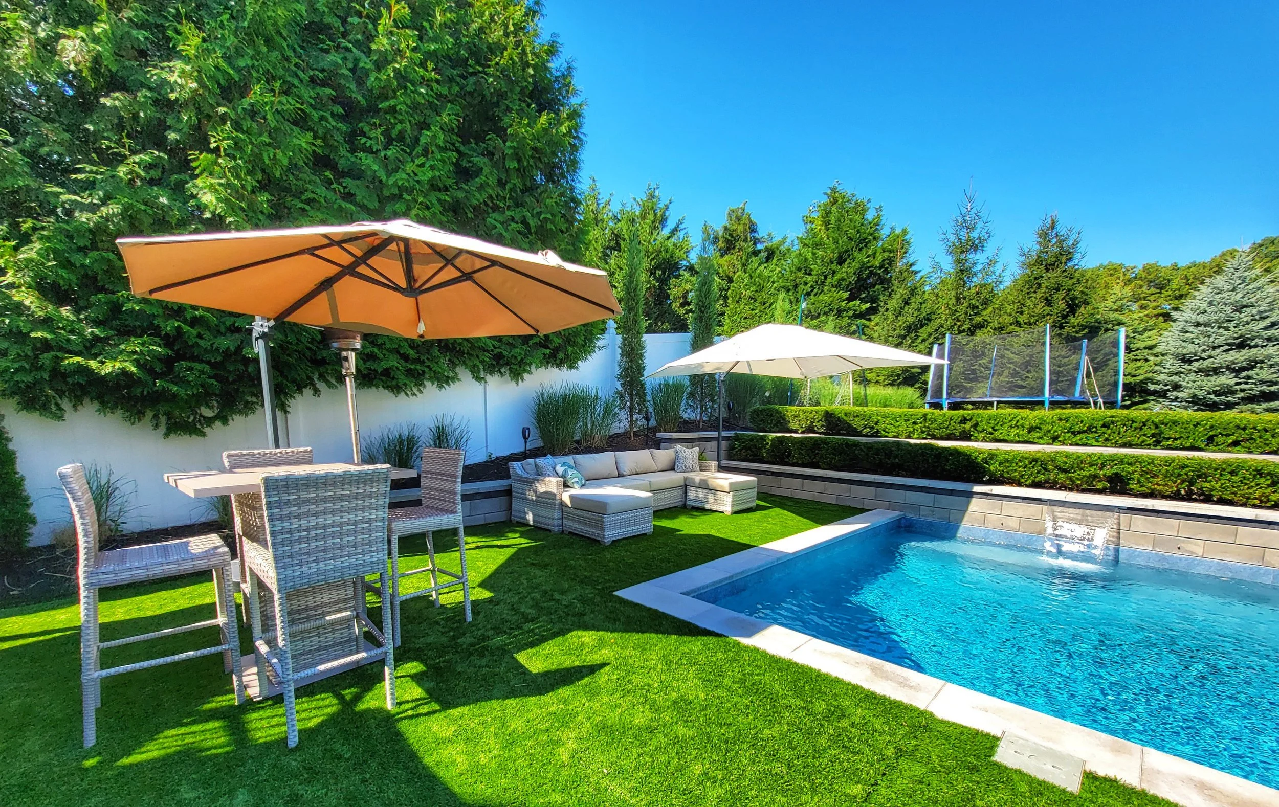 Design the Perfect Poolside Lounge for Family Gatherings With a Custom Swimming Pool in Cold Spring Harbor, NY