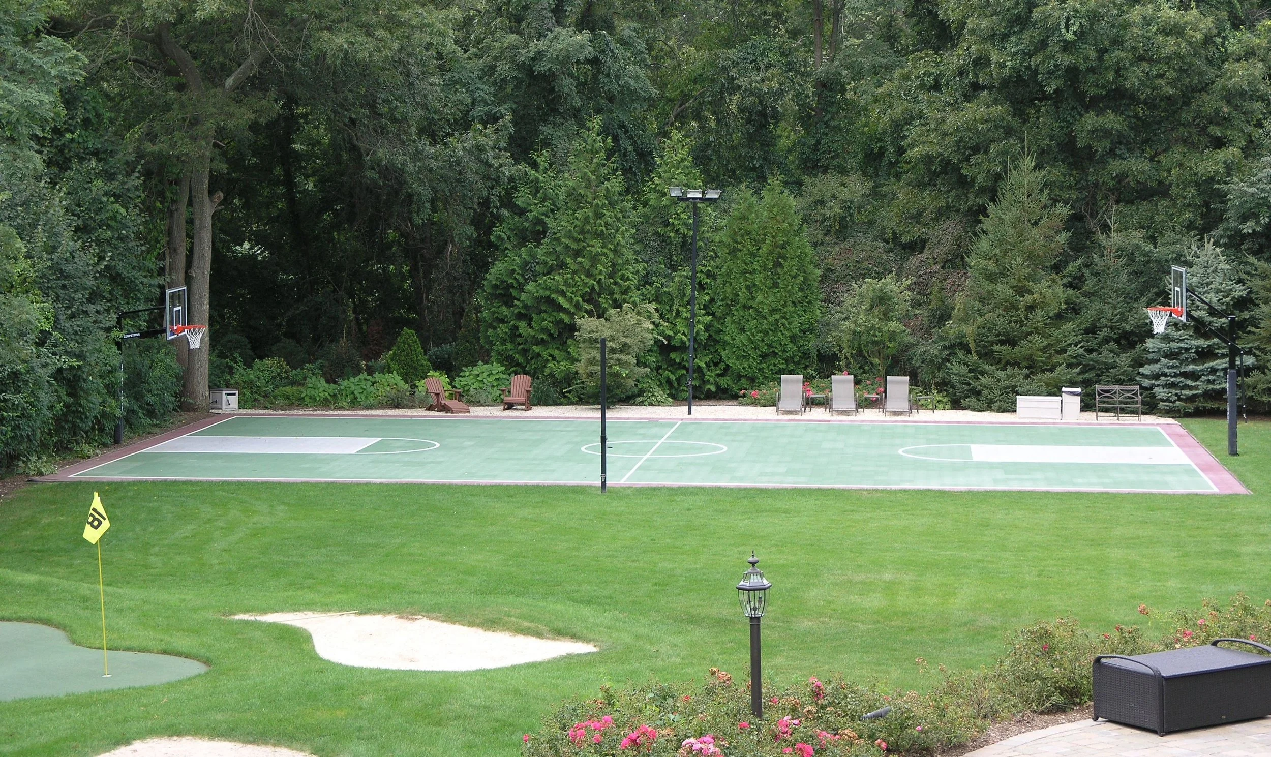 Install a Game Court Alongside a Swimming Pool for the Ultimate Entertaining Space in the Southampton and Stony Brook, NY, Areas