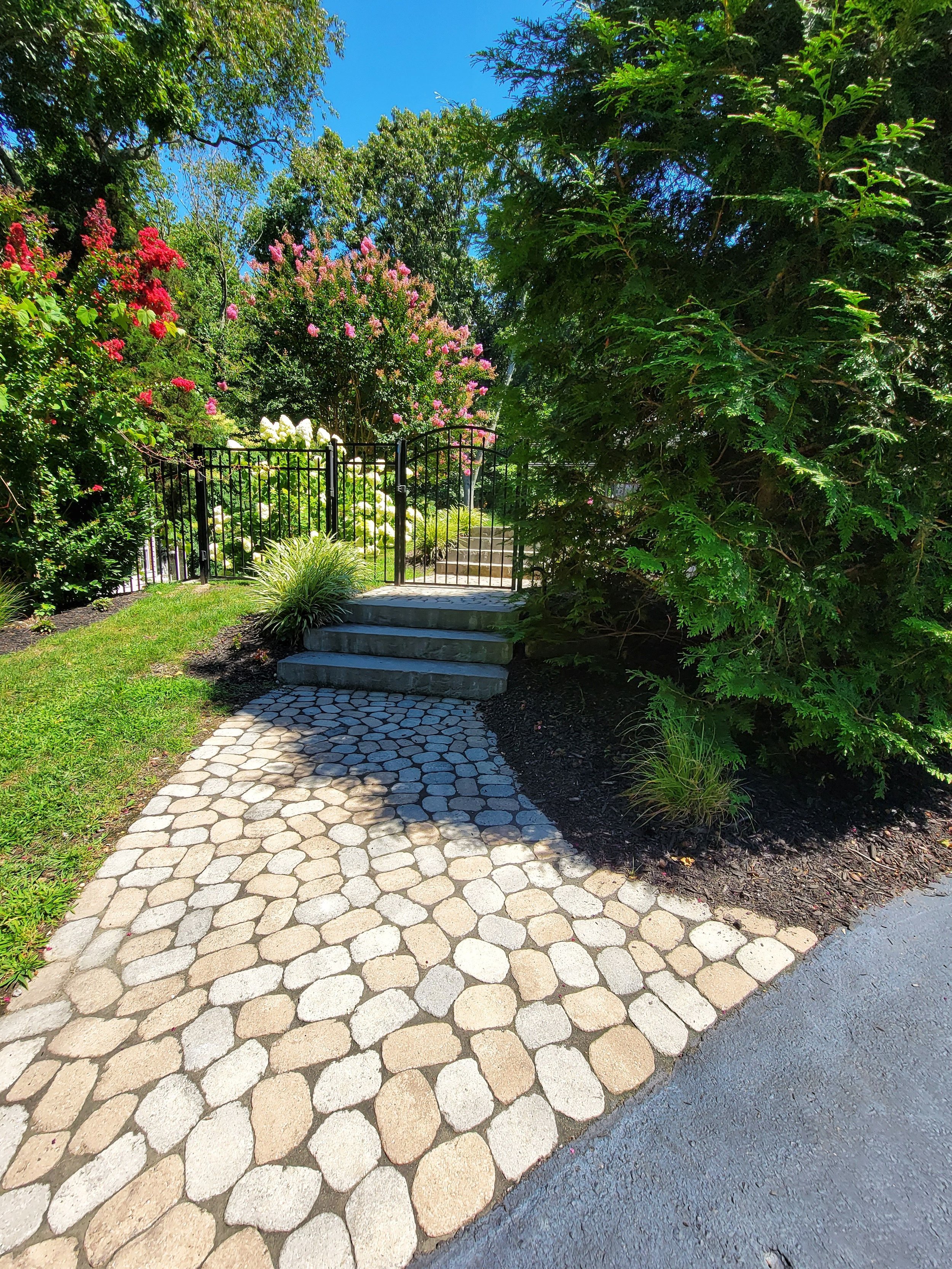 3 Tips for a Landscape Design with a Seamless Transition from the Front Yard to Backyard in the Deer Park and Port Washington, NY Areas