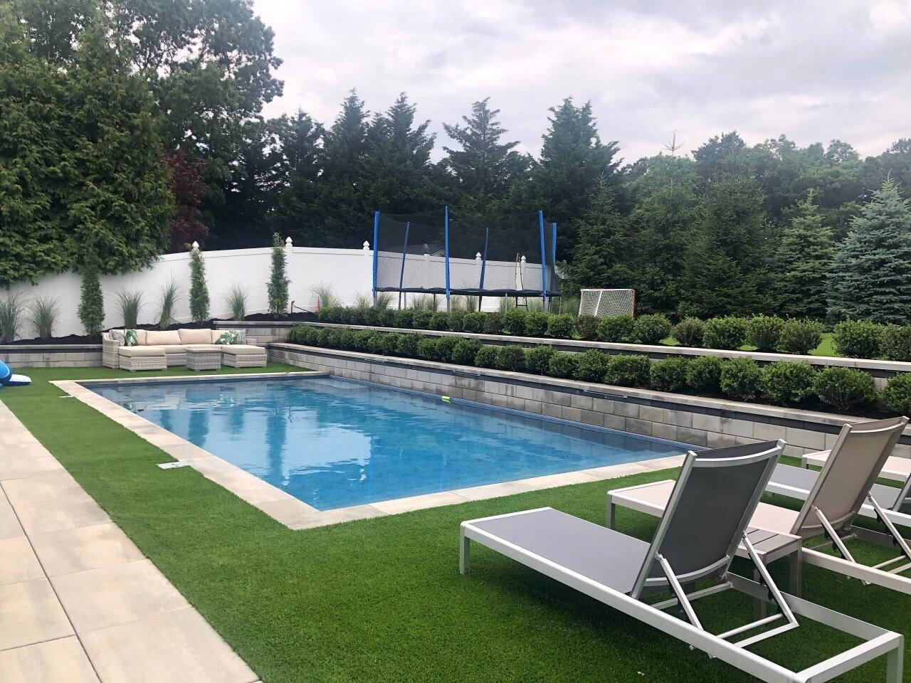 Backyard Transformations: What Should the Area Around Your Swimming Pool Look Like in Mt. Sinai, NY? 