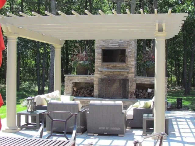 How an Outdoor Fireplace Can Be Included in an Island-Style Landscape Design in Northport, NY