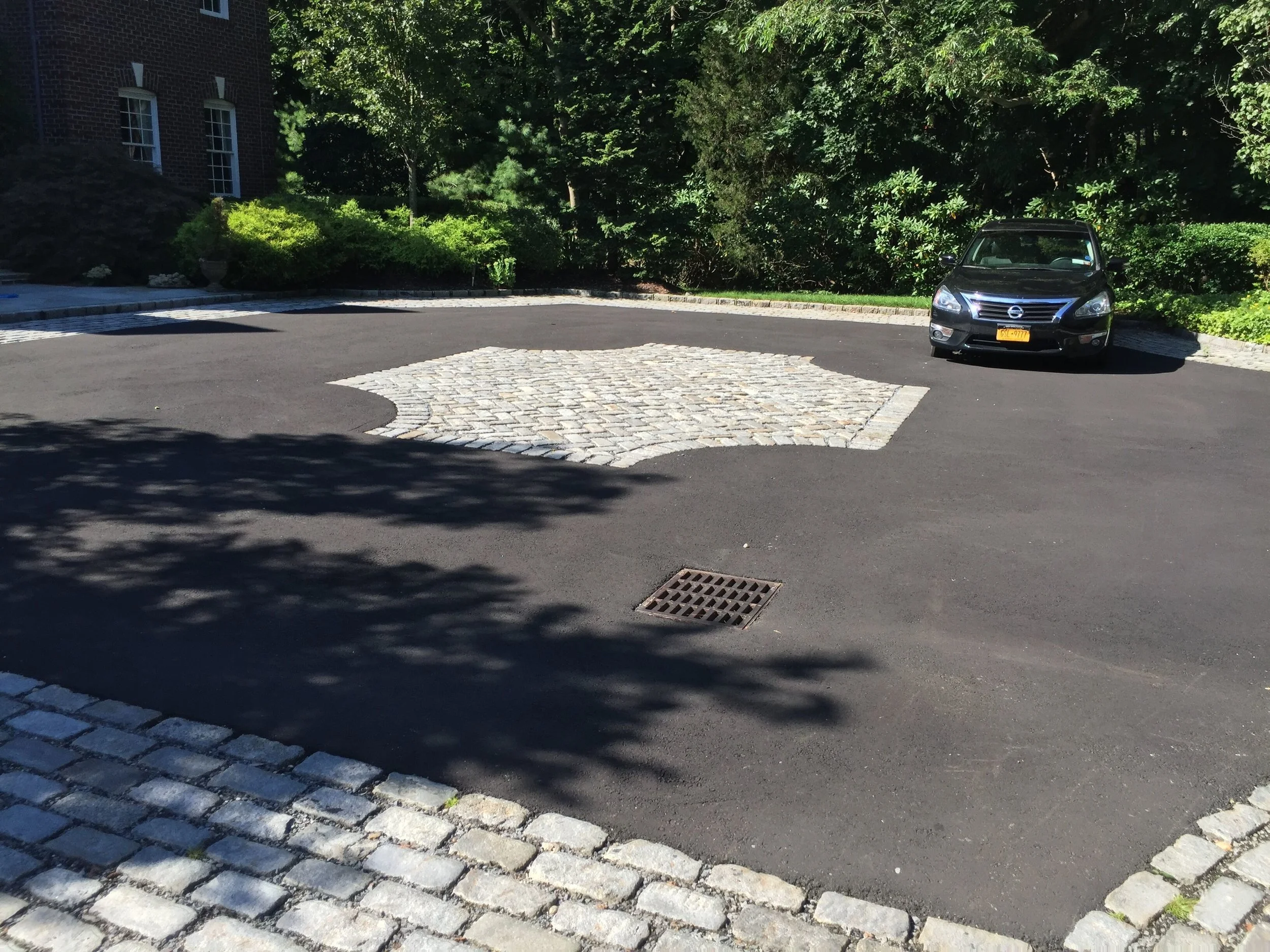 Artistic Masonry Inlays to Add Detail to Your Long Island, NY, Driveway