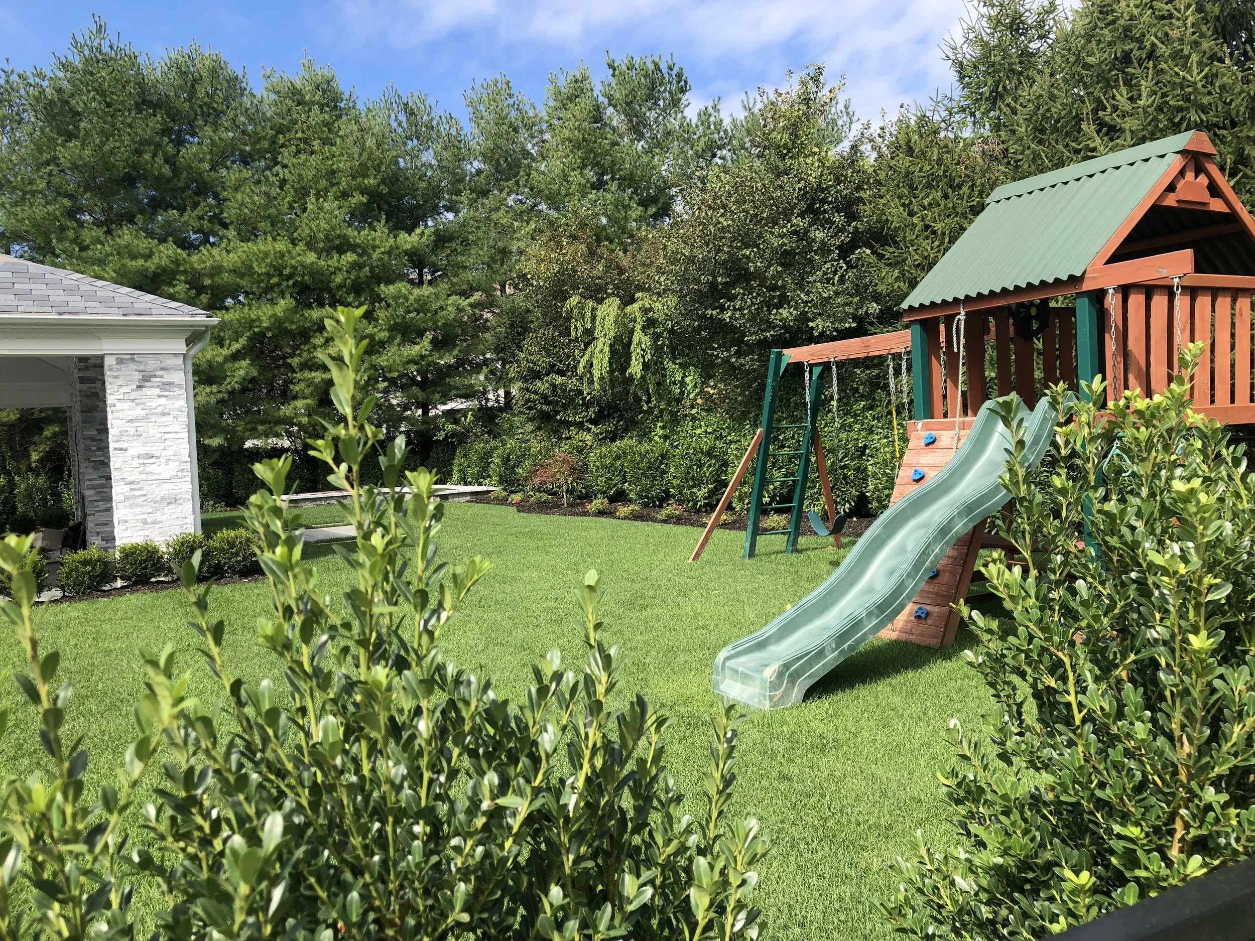 Our Top Landscape Design Tips for Creating the Backyard of Your Child’s Dreams in Your Huntington, NY, Home