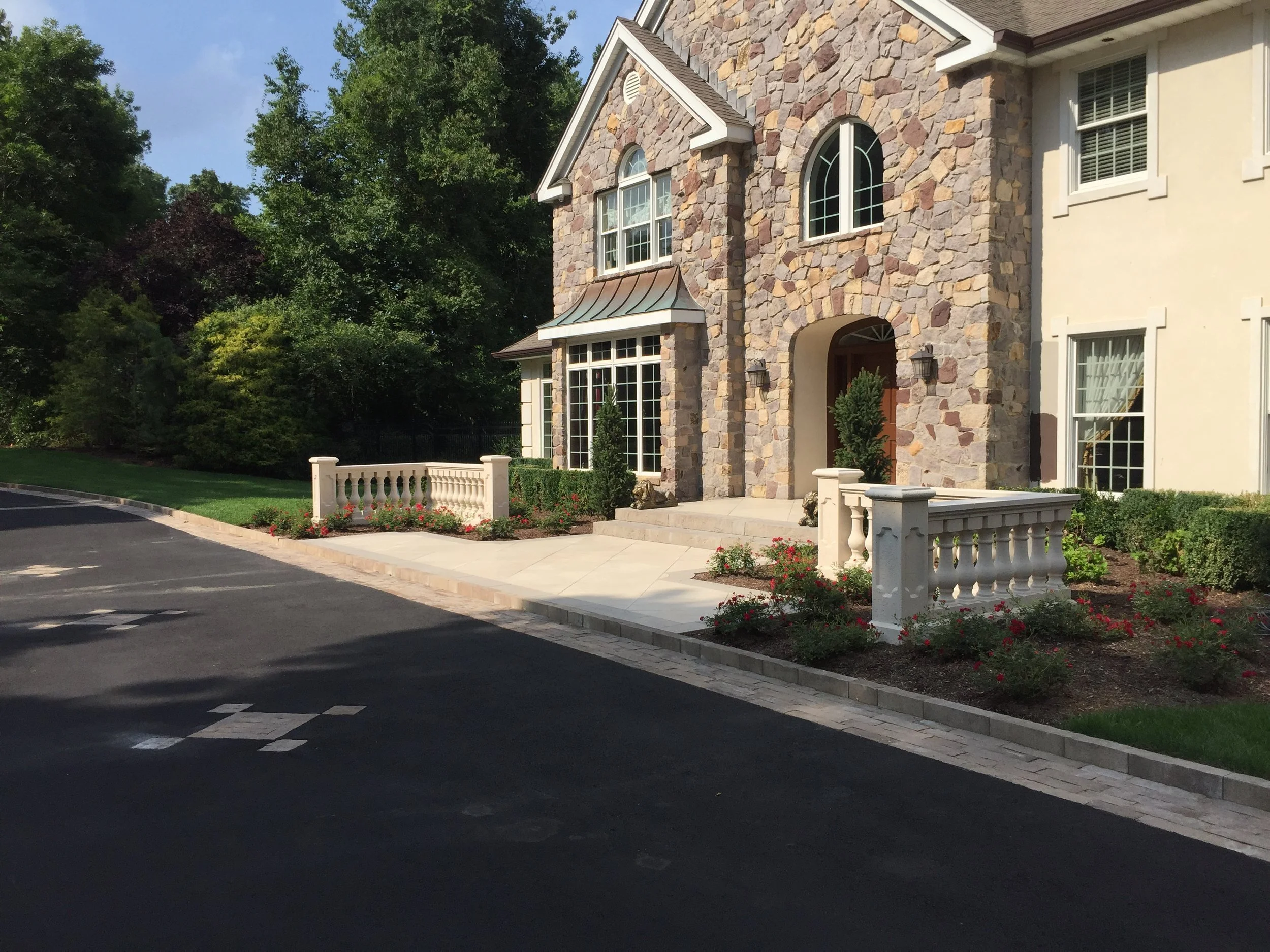 Professional landscape design with a paved walkway in Long Island, NY (Copy)
